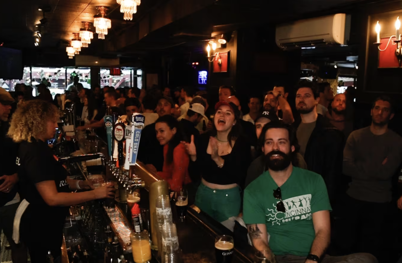 Football fans watching a live match at The Red Lion soccer bar on Bleecker Street, Greenwich Village NYC