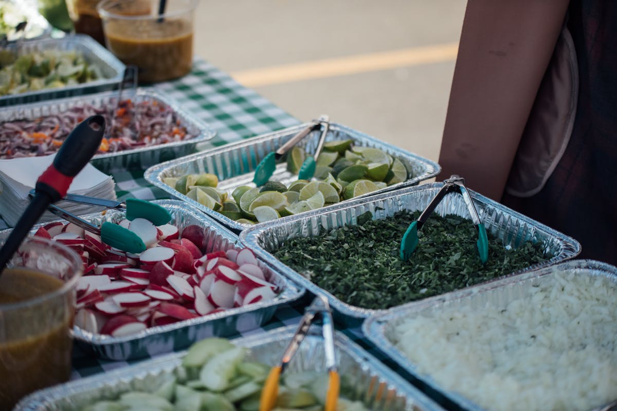 a bowl of food on a picnic table