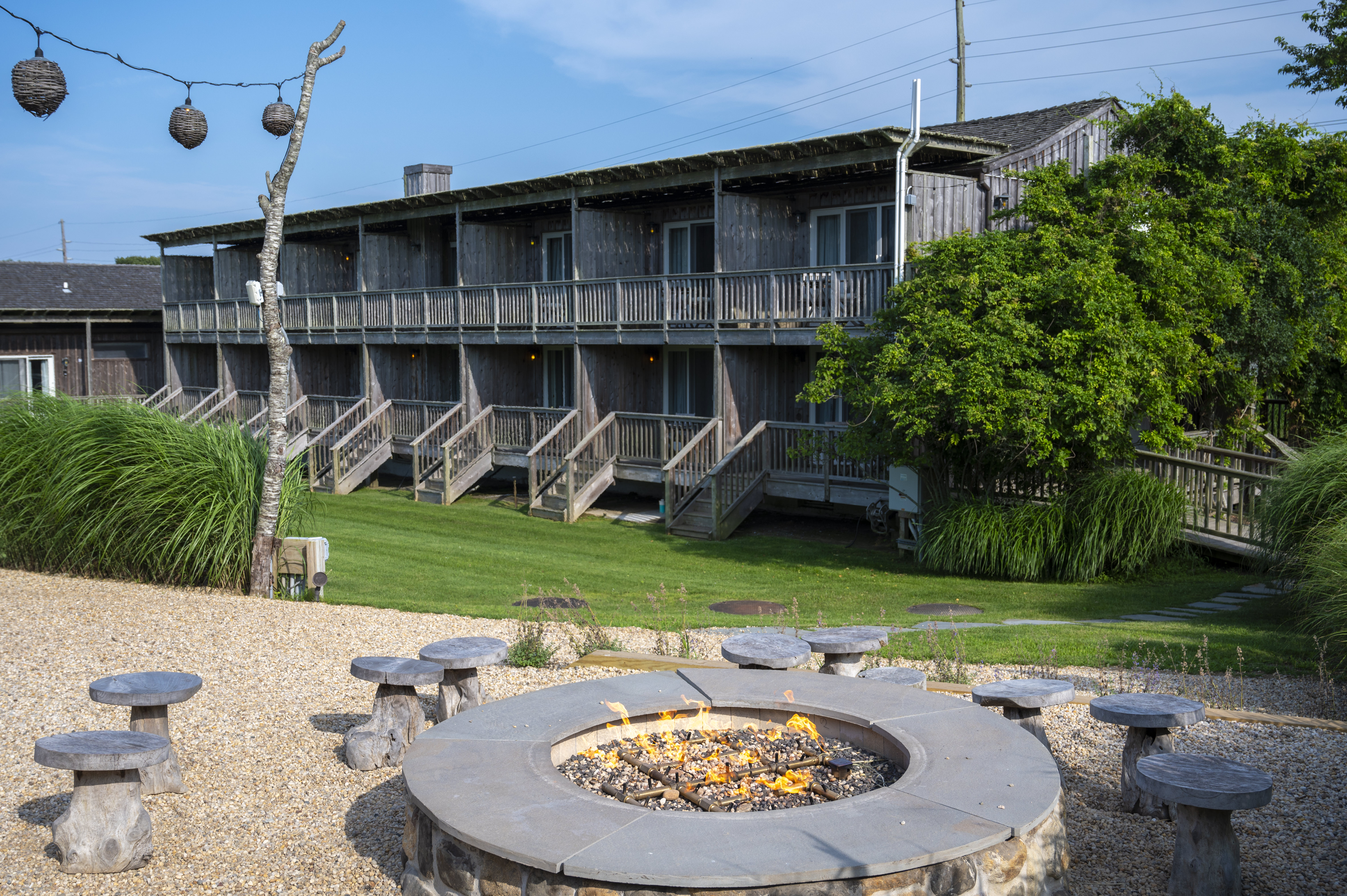 a fire pit in front of a building