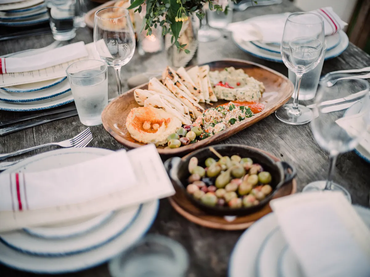 a table topped with plates of food on a plate