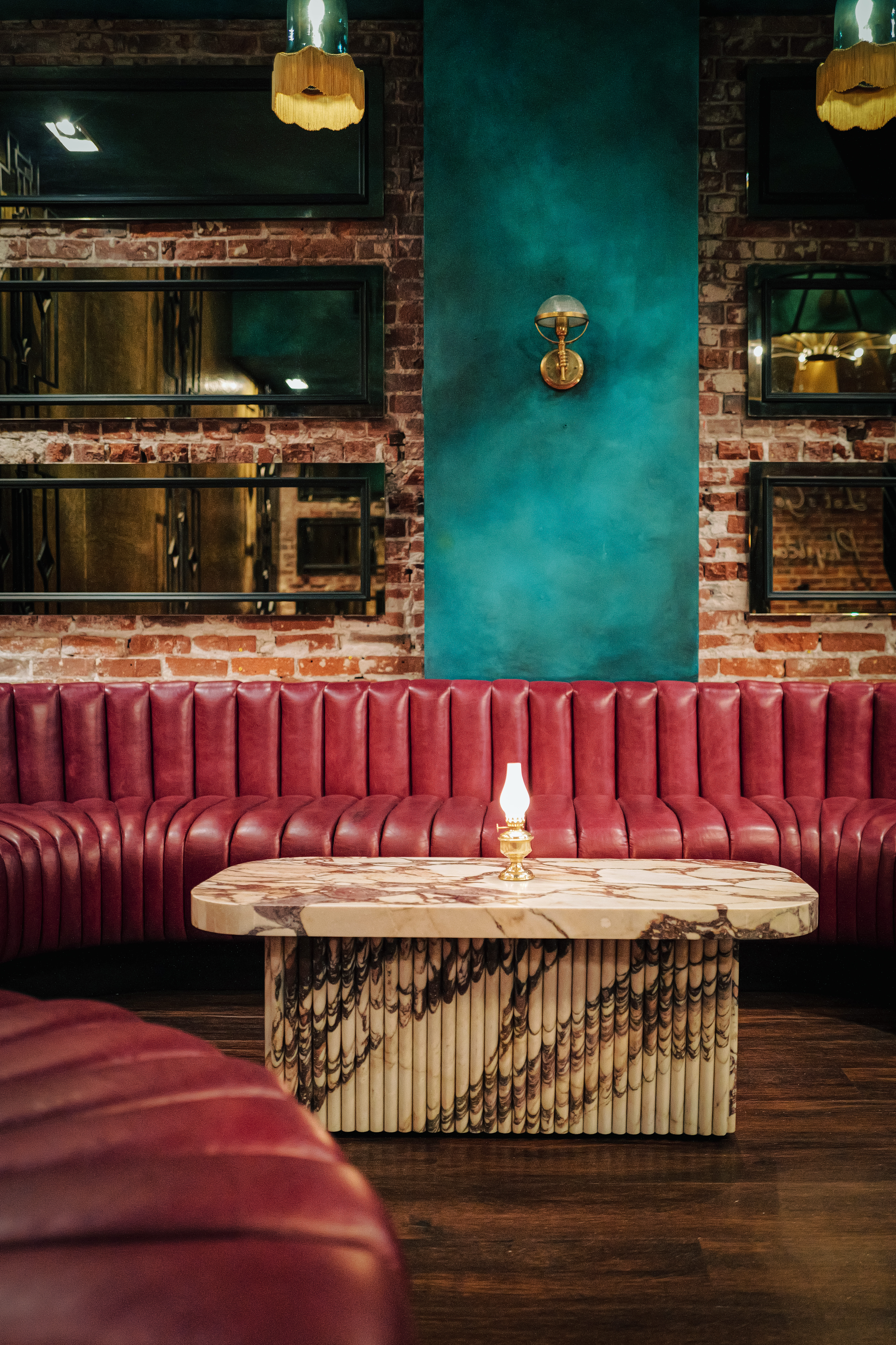 a fire place sitting in a chair in a room