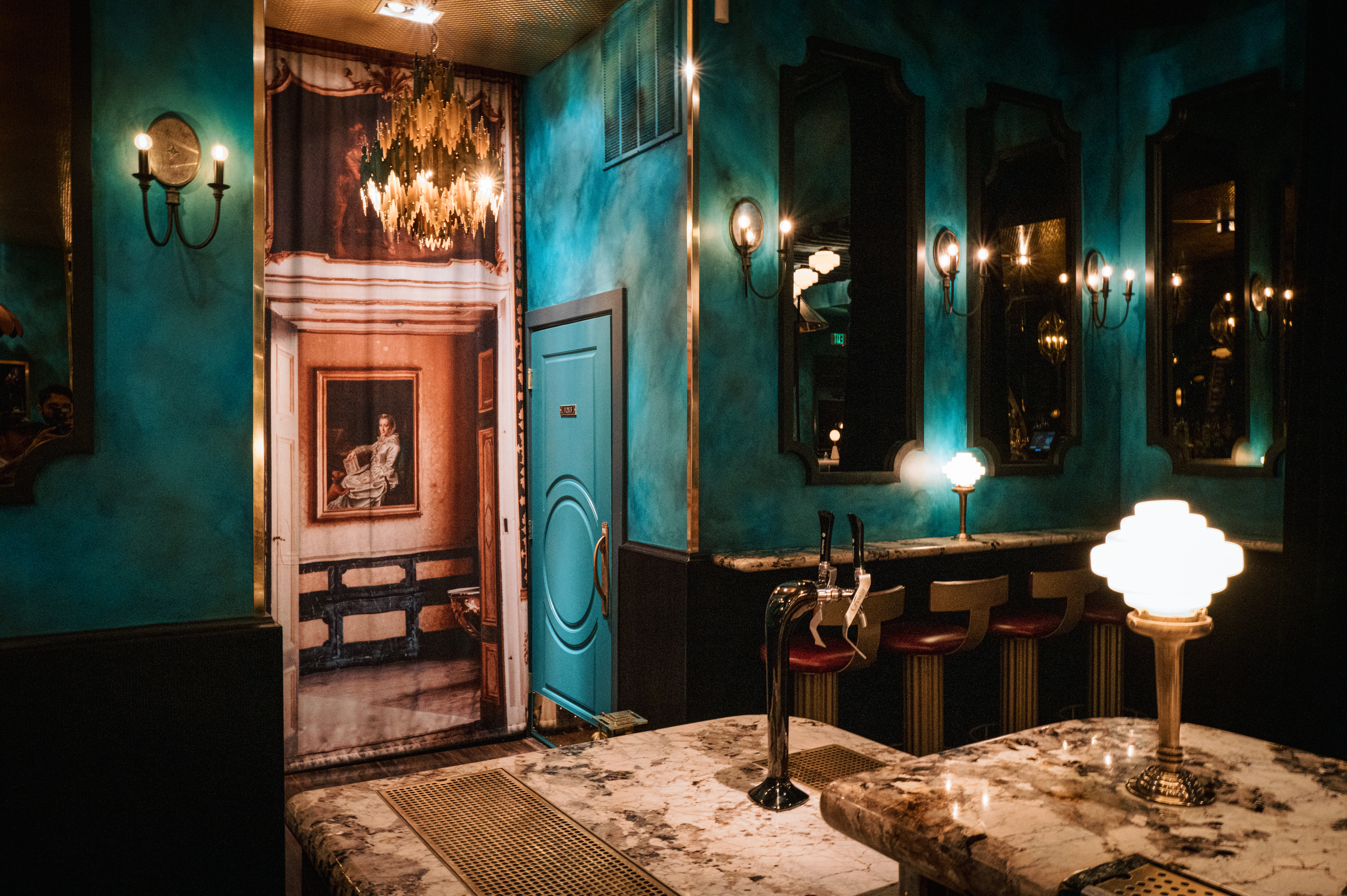 a bedroom with a bed and looking at the camera