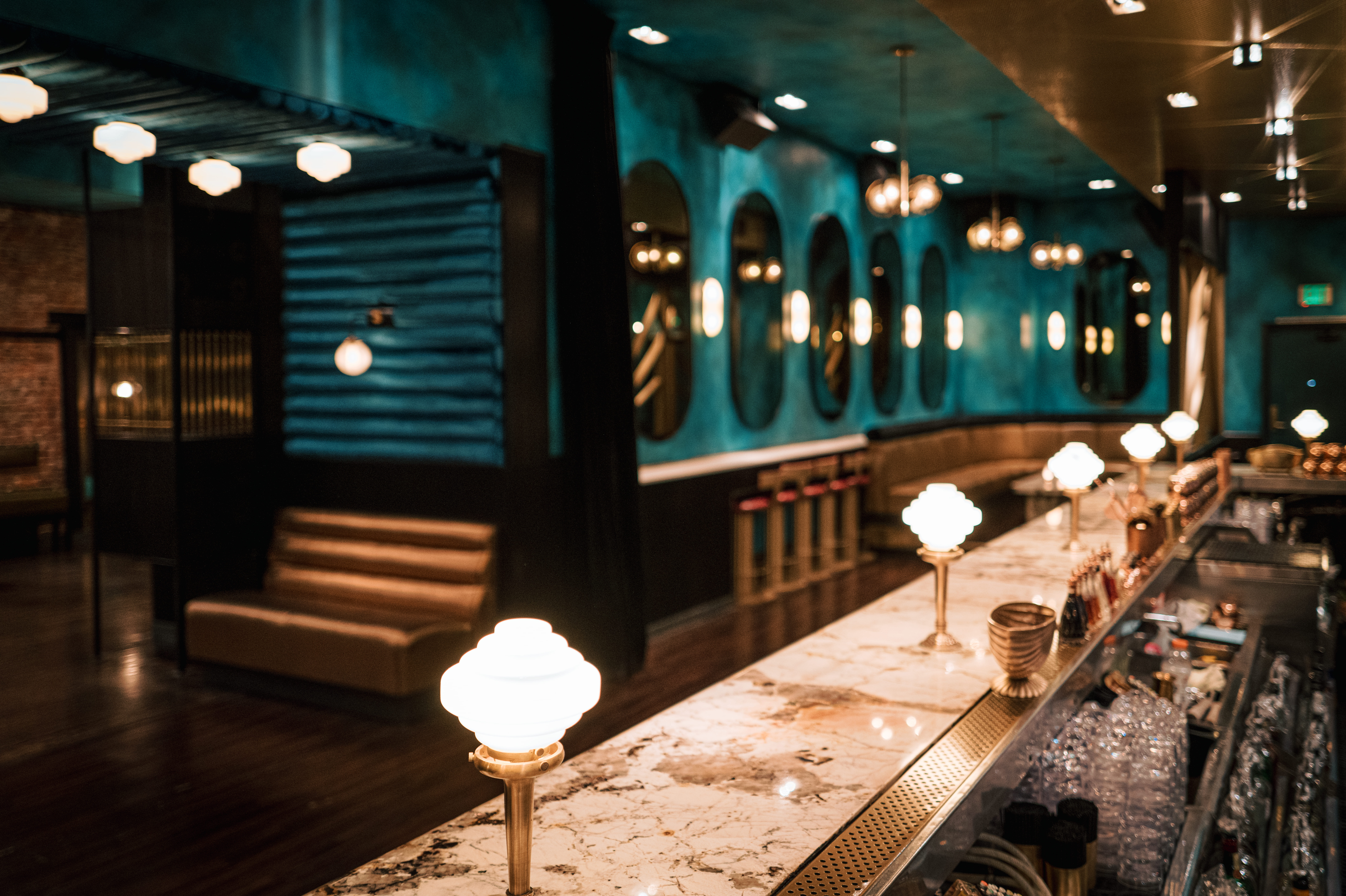 a group of people sitting at a train station