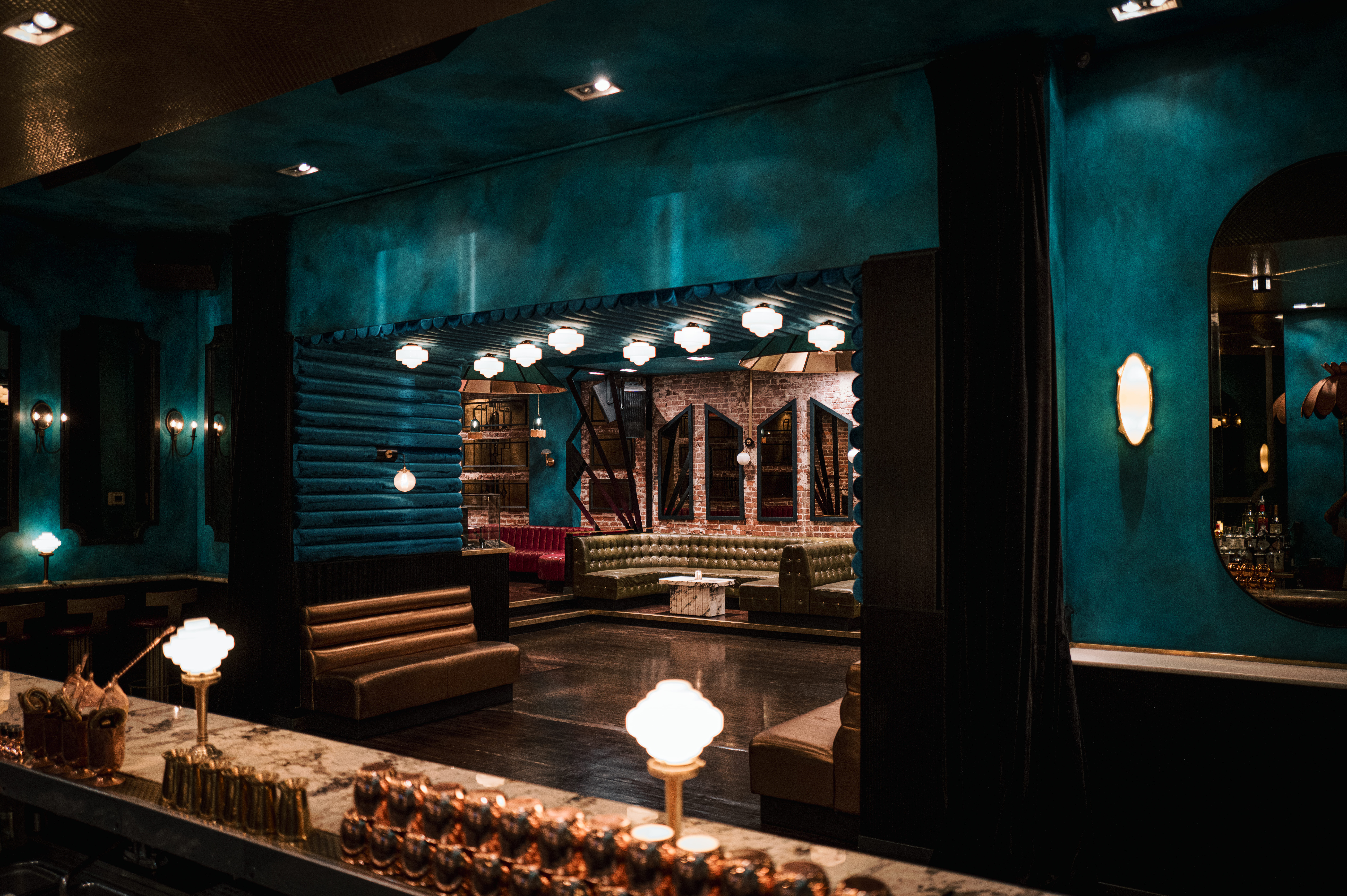 a person standing in front of a mirror posing for the camera