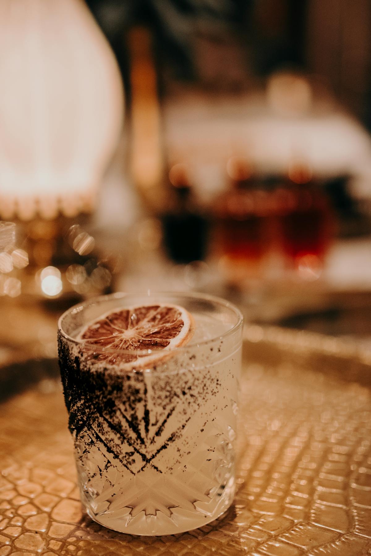 a close up of a glass cup on a table