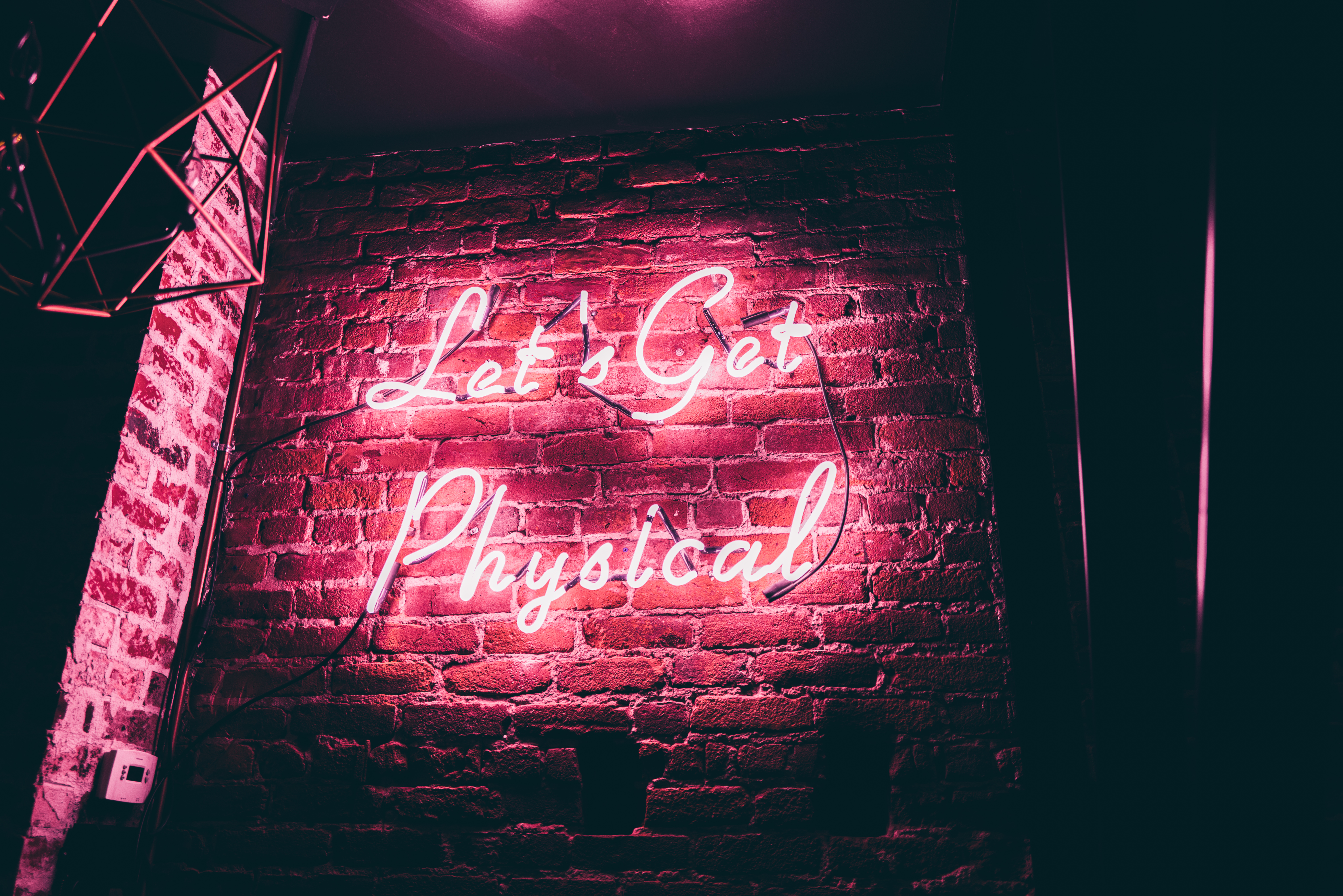 a sign in a dark room