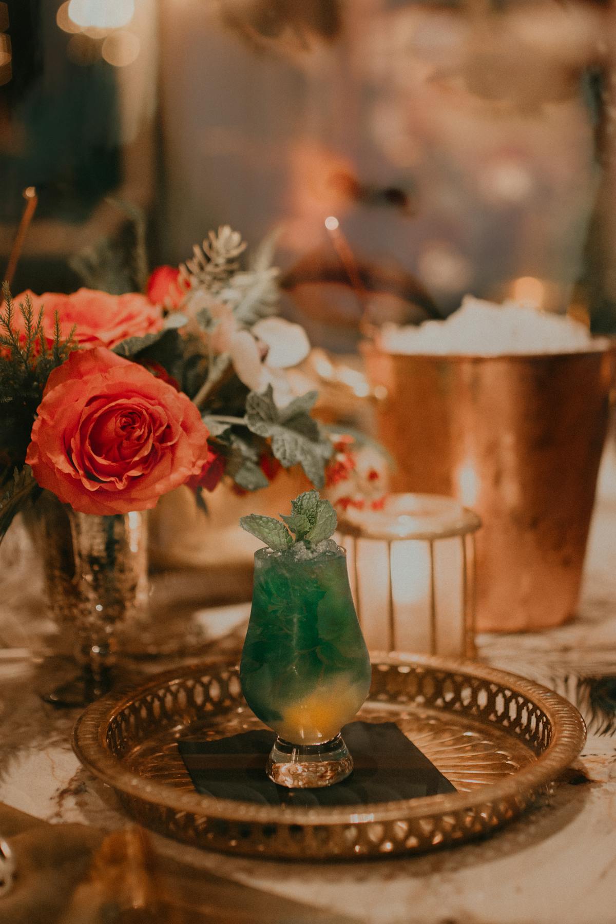 a vase of flowers sitting on a table
