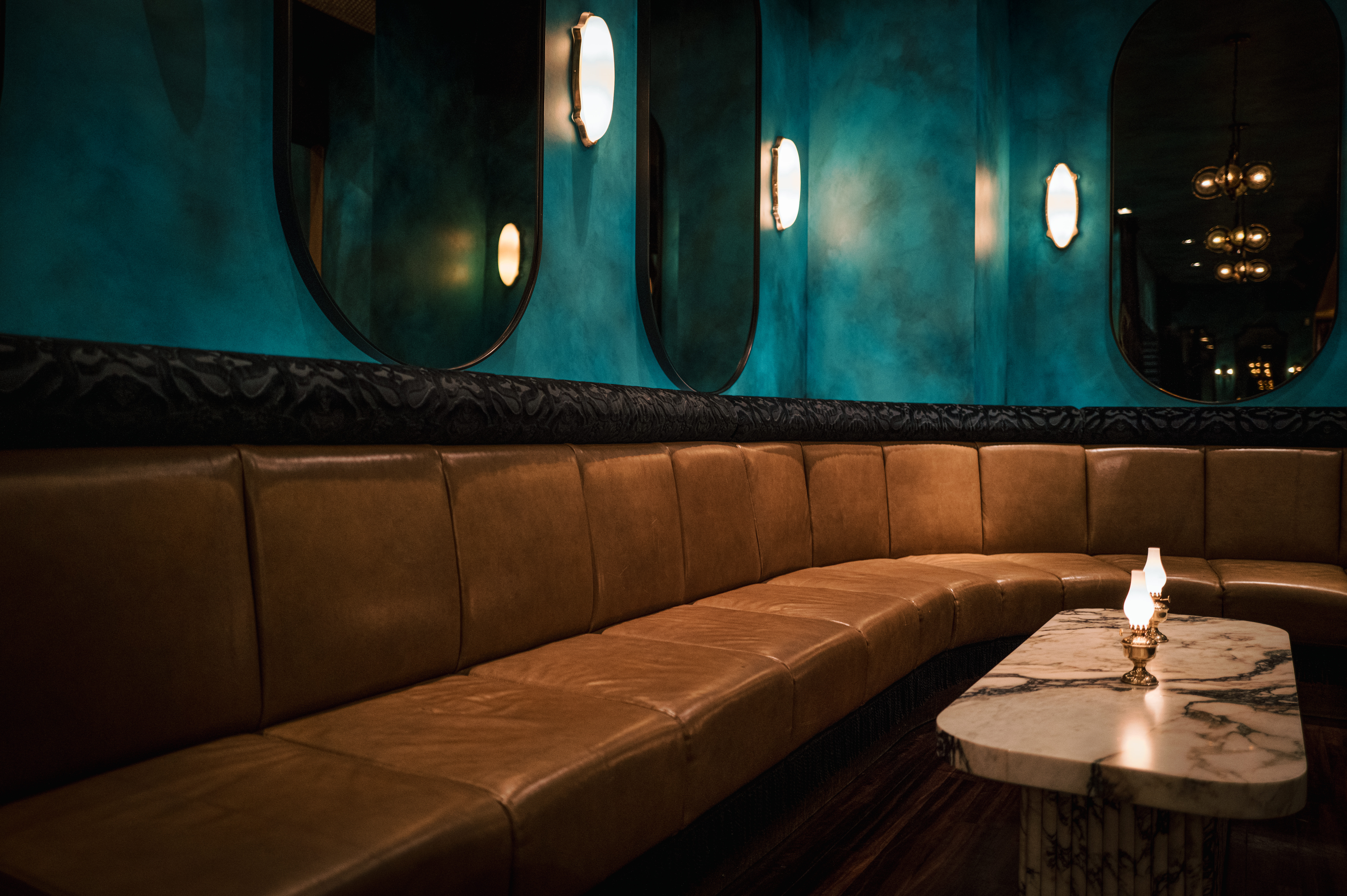 a close up of a sink and a mirror