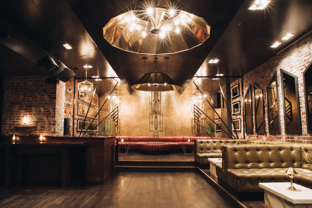 a kitchen with a stove top oven sitting inside of a building