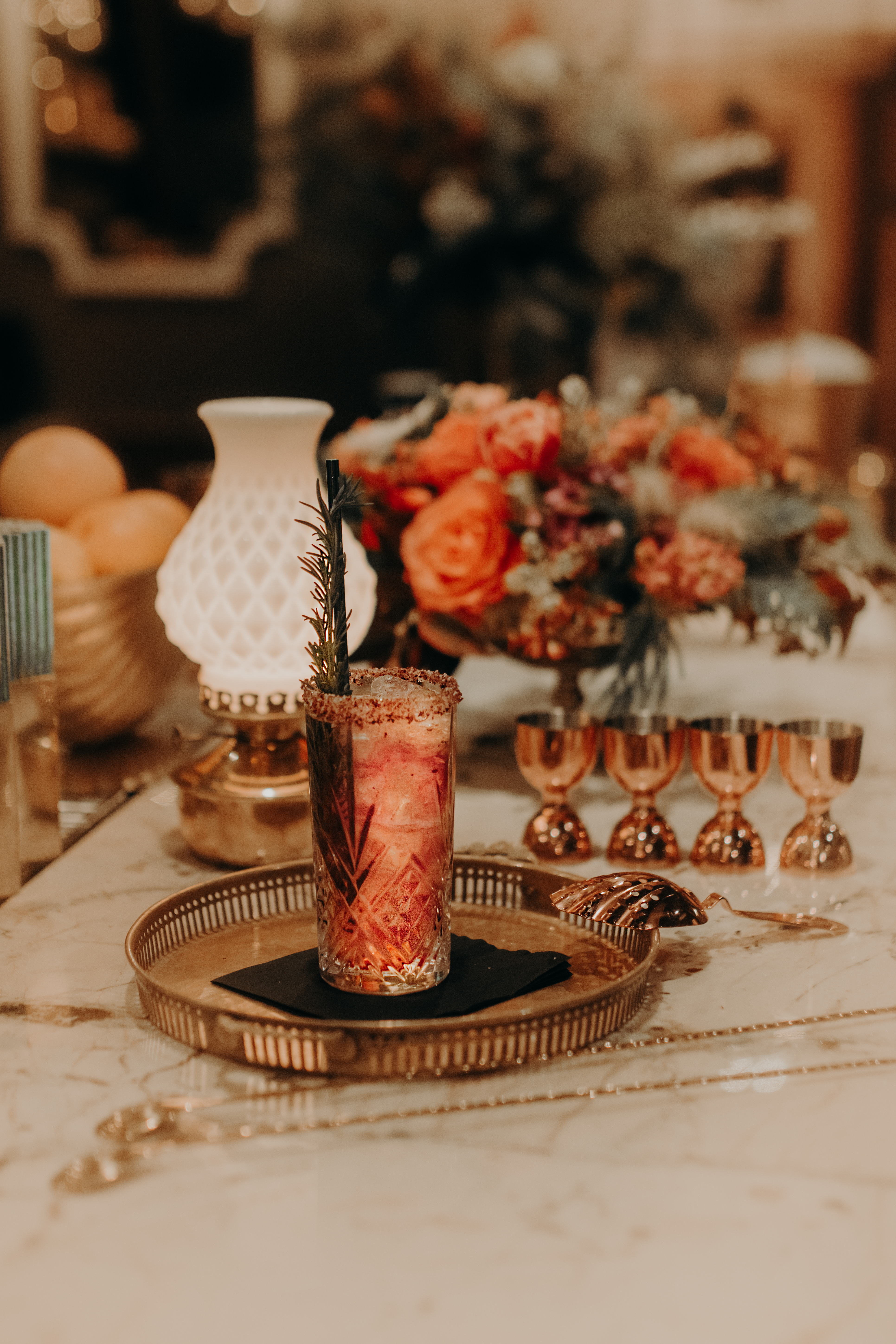 a vase of flowers sitting on a table