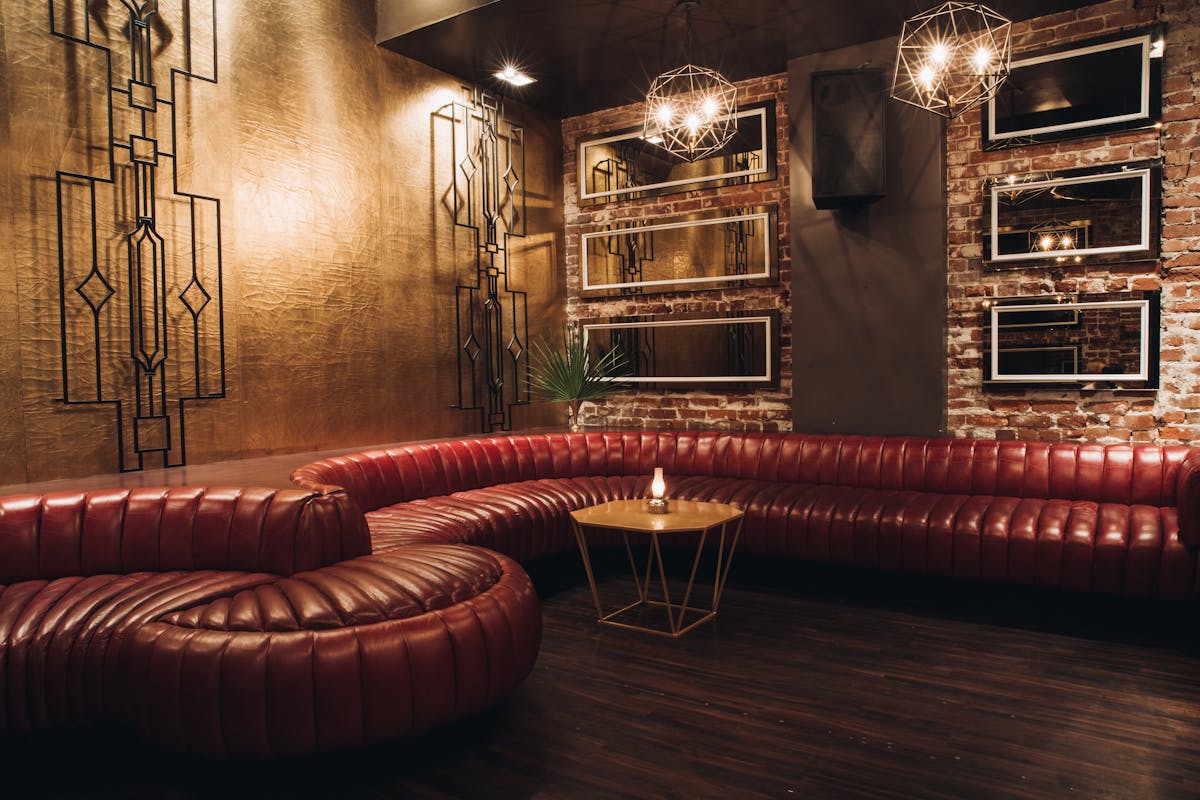 a room filled with furniture and a fireplace