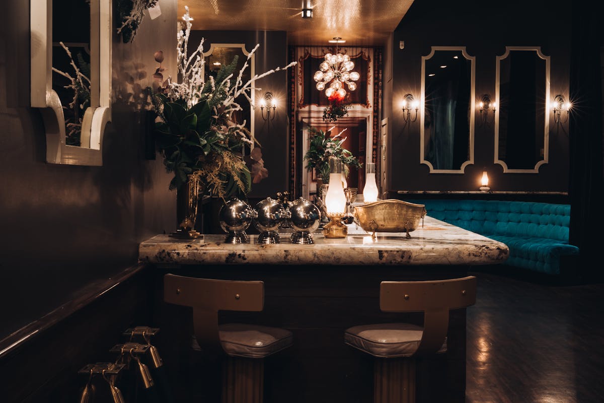 a sink and a mirror in a dark room