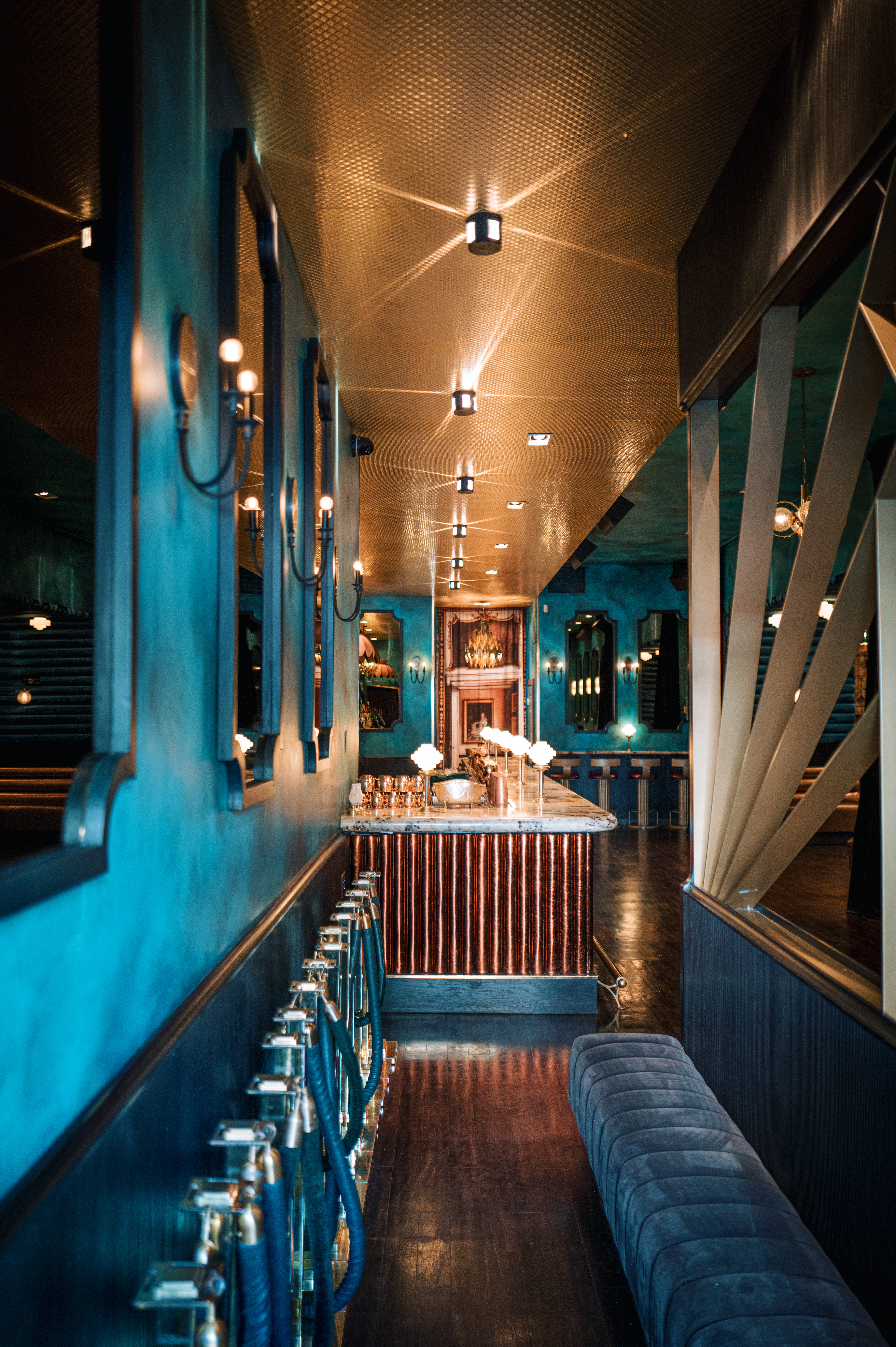 a kitchen with a blue chair