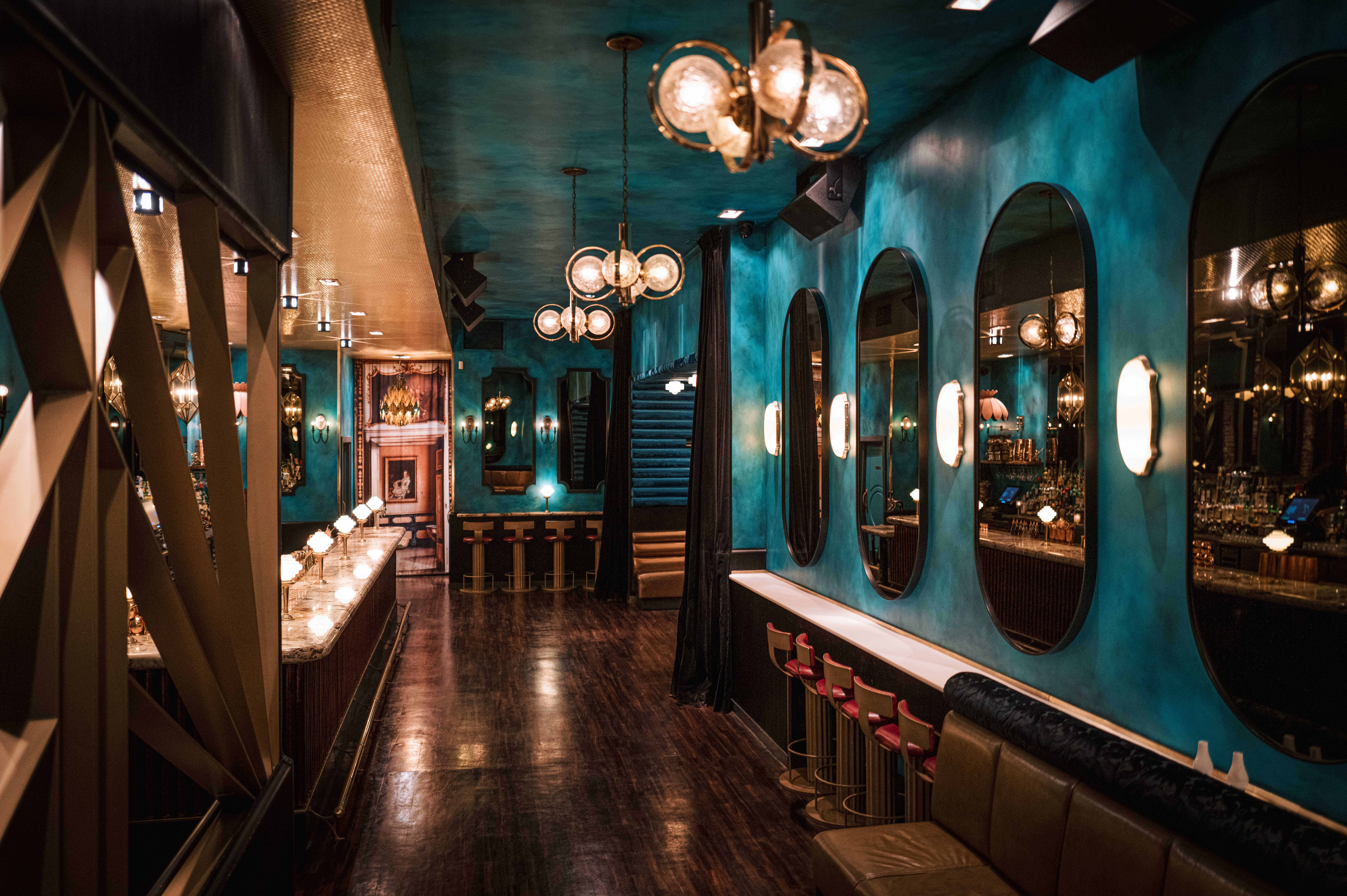 a group of people sitting at a train station