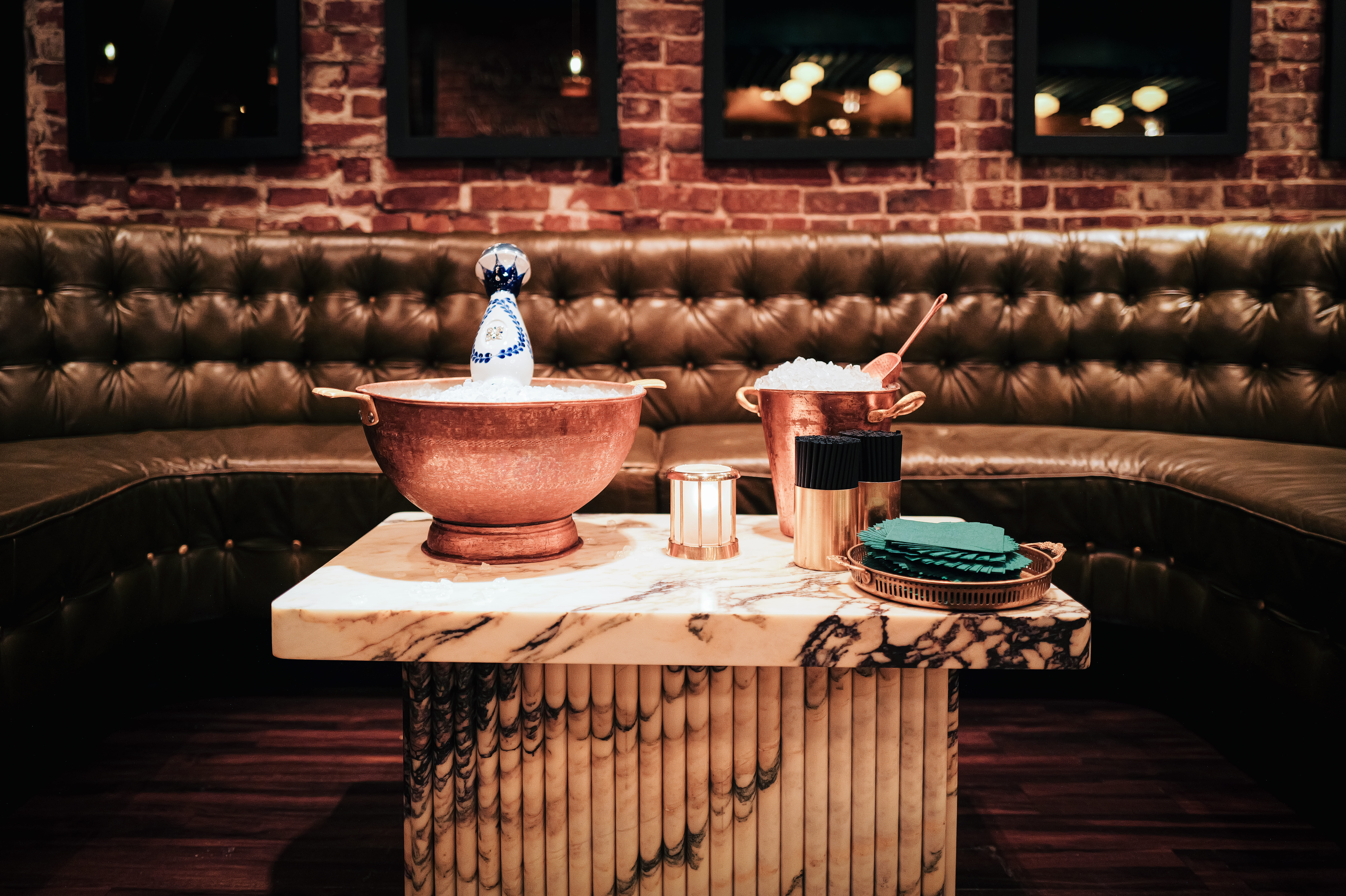 a row of wooden benches sitting on top of a building