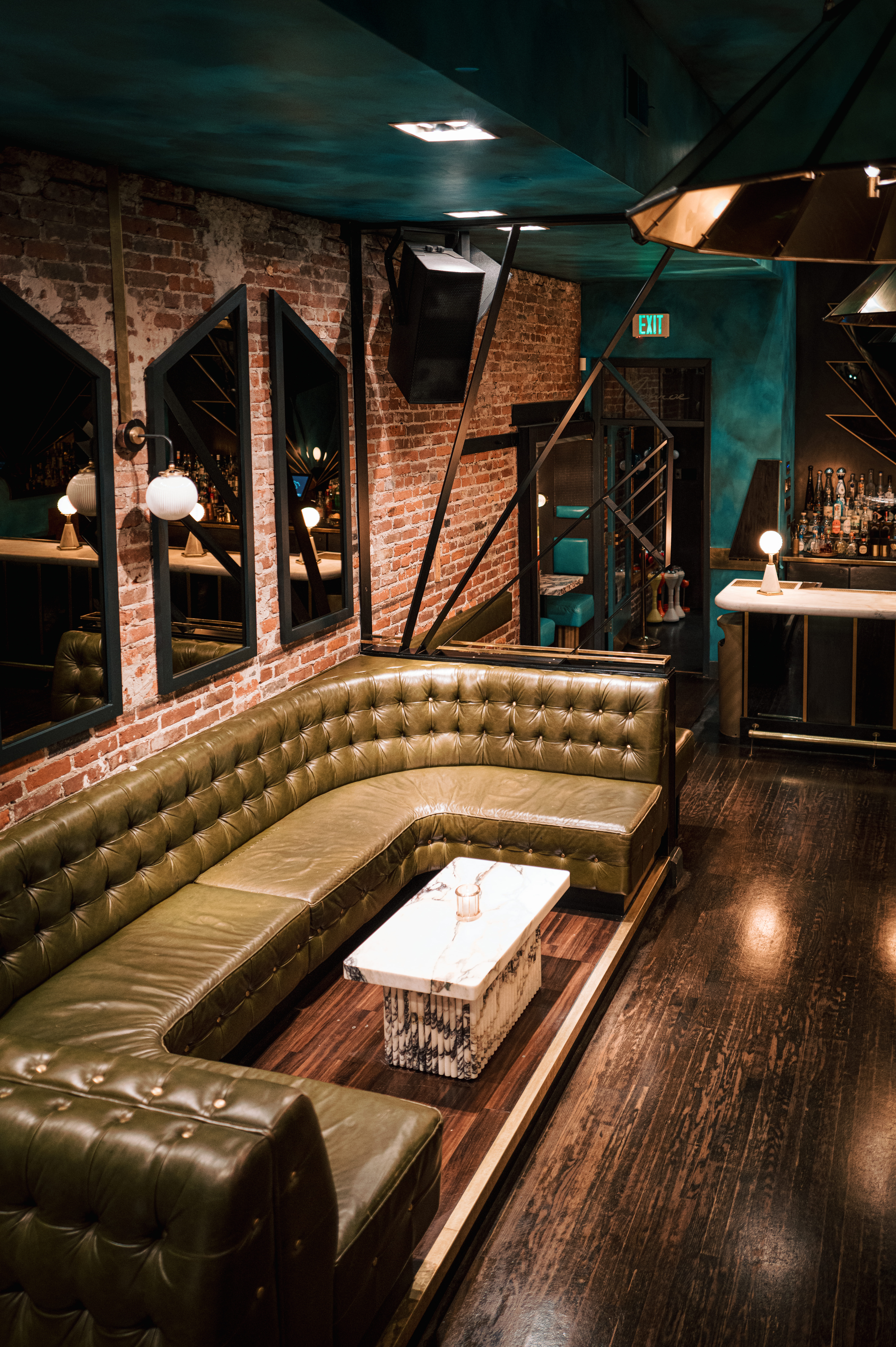 a train that is sitting on a chair in a room