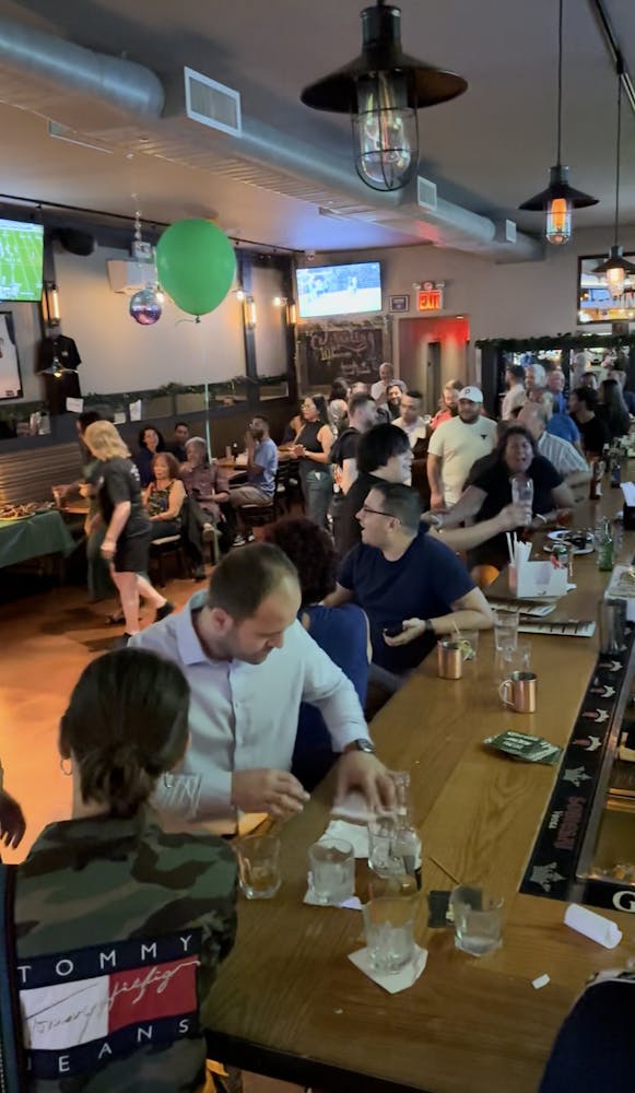 a group of people sitting at a table