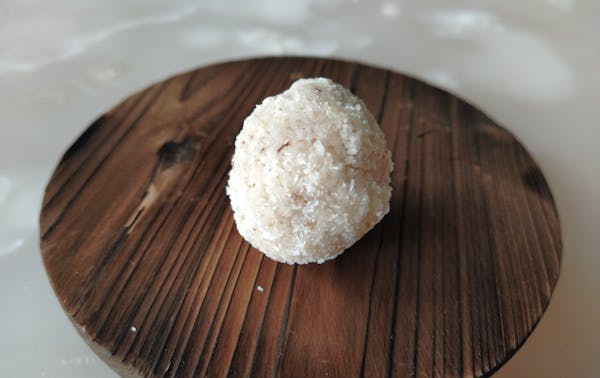 a piece of cake sitting on top of a wooden table