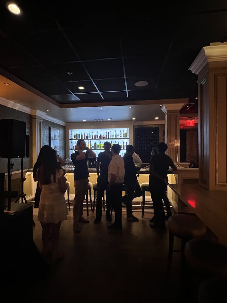 a group of people standing in a room