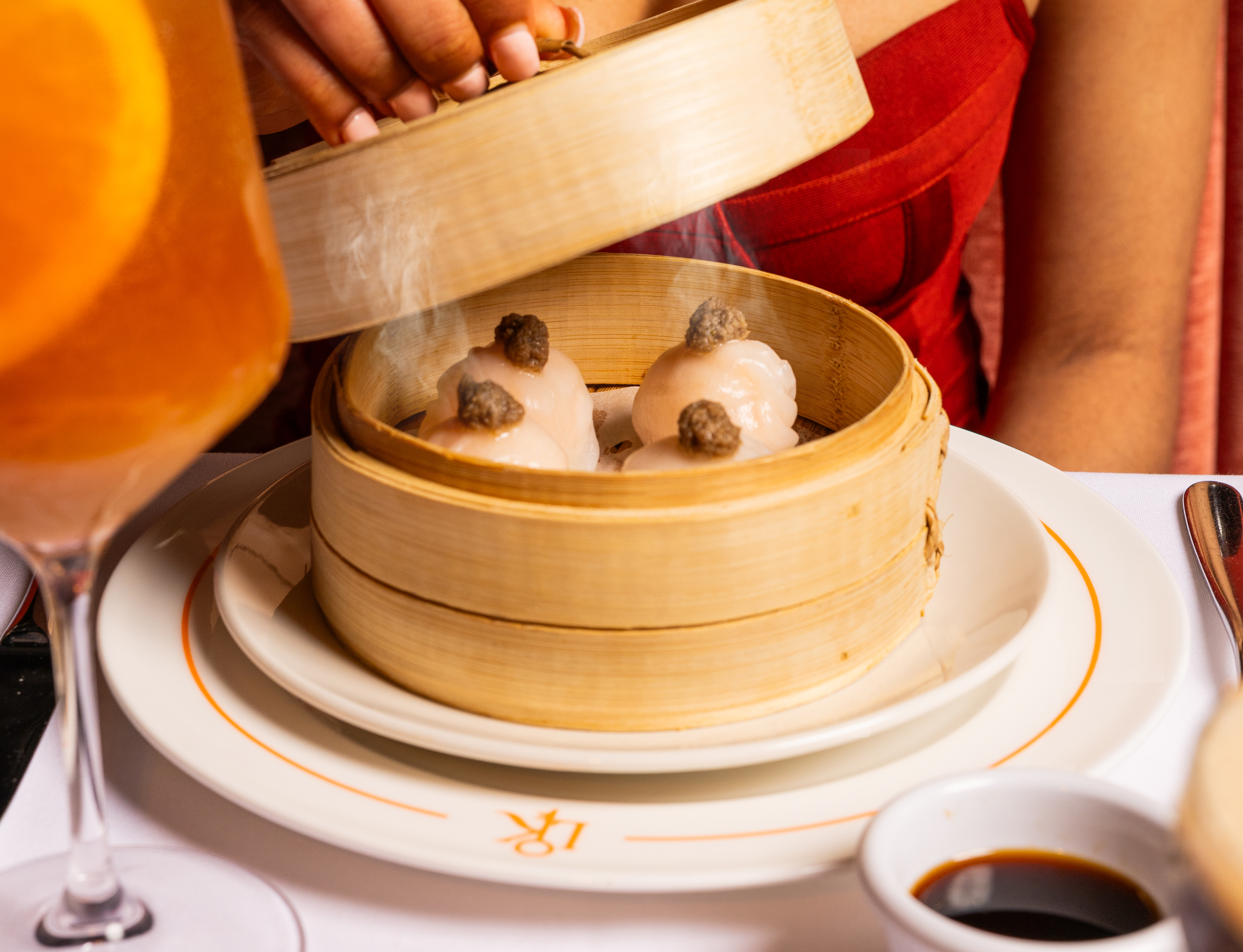 Shrimp dumplings with truffle sauce appetizer at Lokee Atlanta