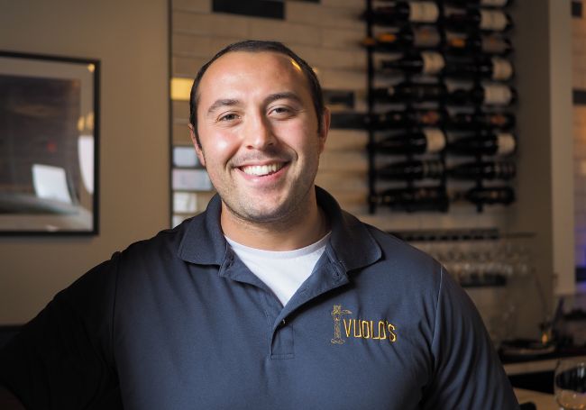 a man smiling for the camera