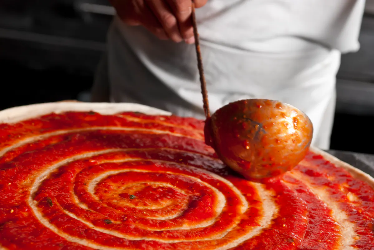 a pizza sitting on top of a table