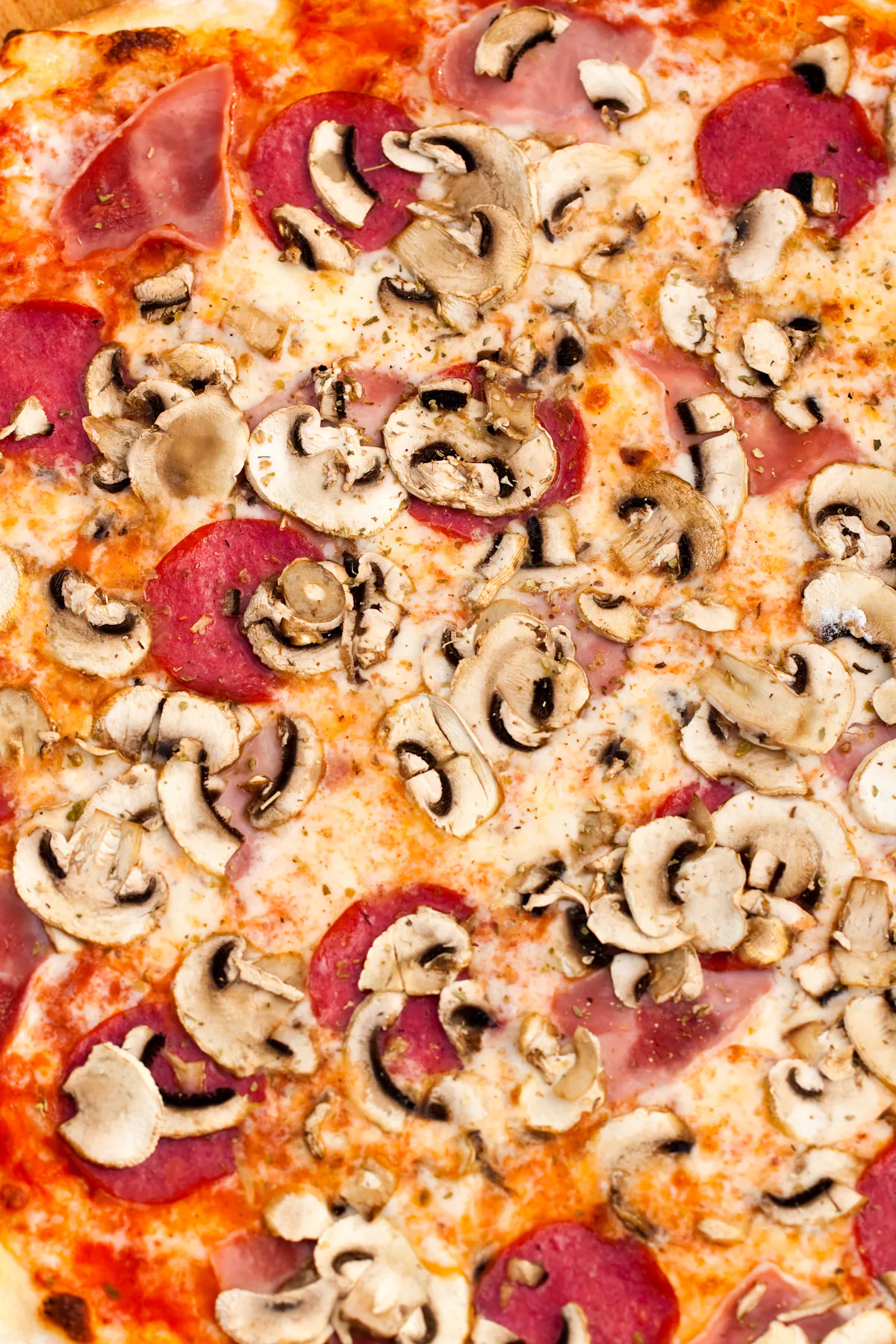 a pizza sitting on top of a pan