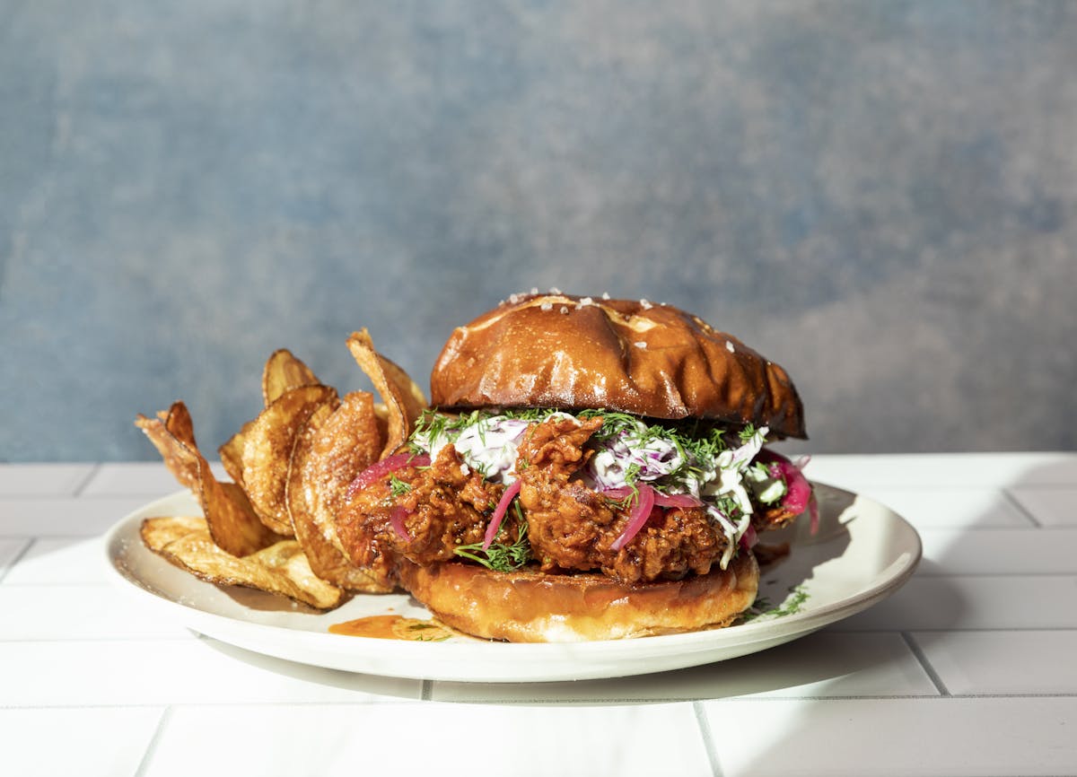 a sandwich sitting on top of a plate of food