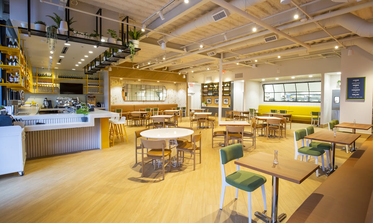 a room filled with furniture and a table