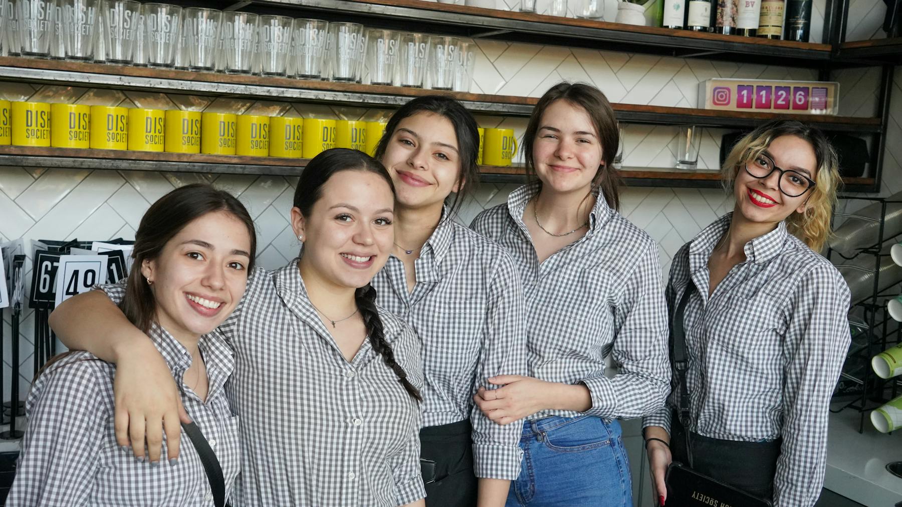 a group of people posing for the camera