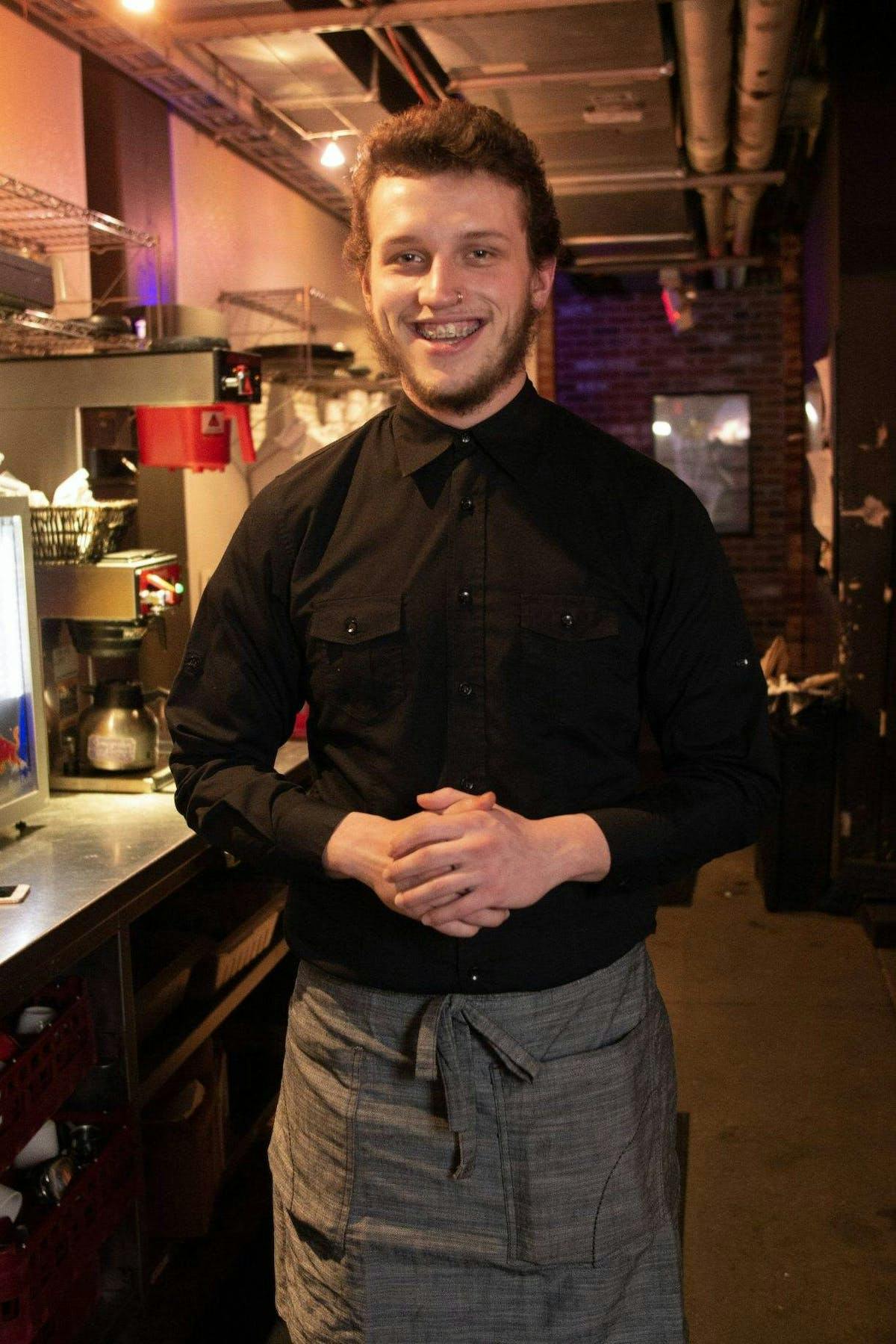 a man standing in a kitchen