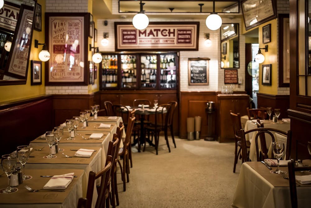 a dining room table in front of a store