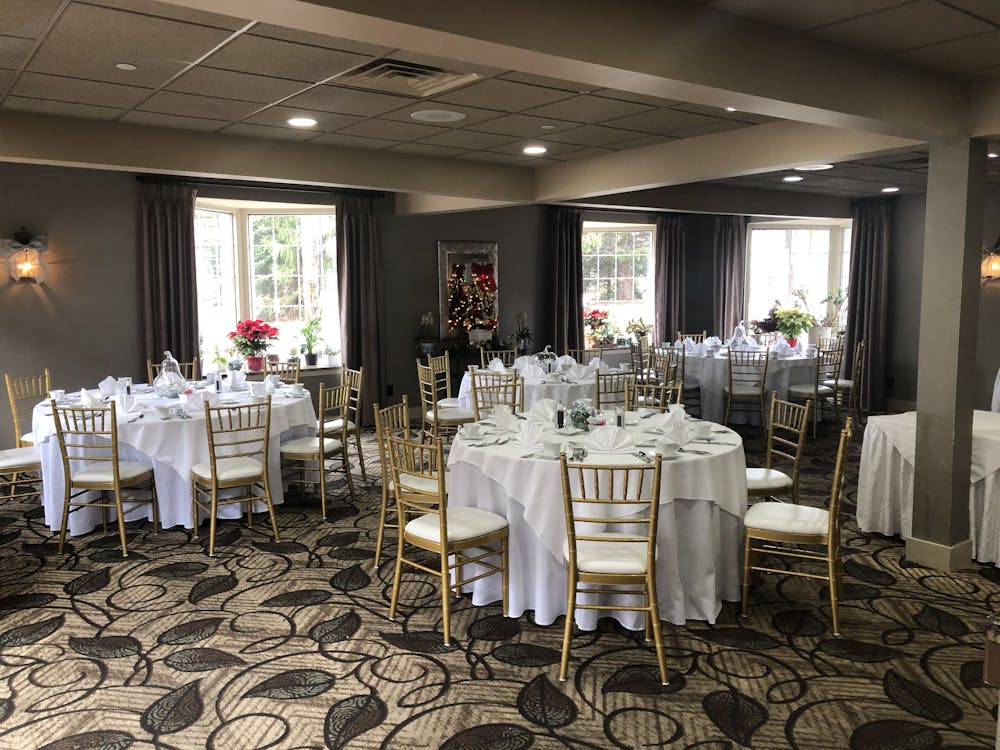 a room filled with furniture and a large window