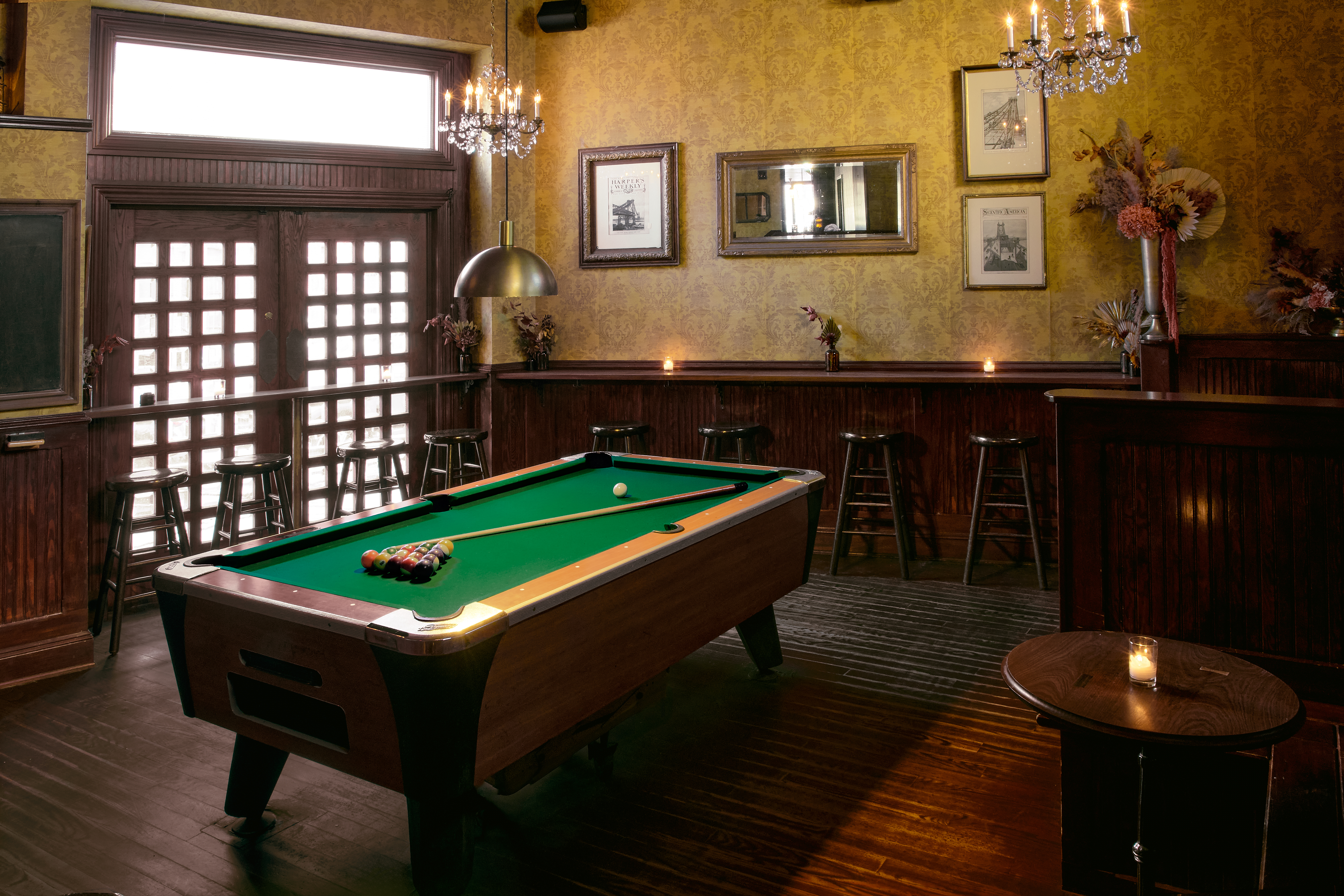 a room filled with furniture and vase on a table