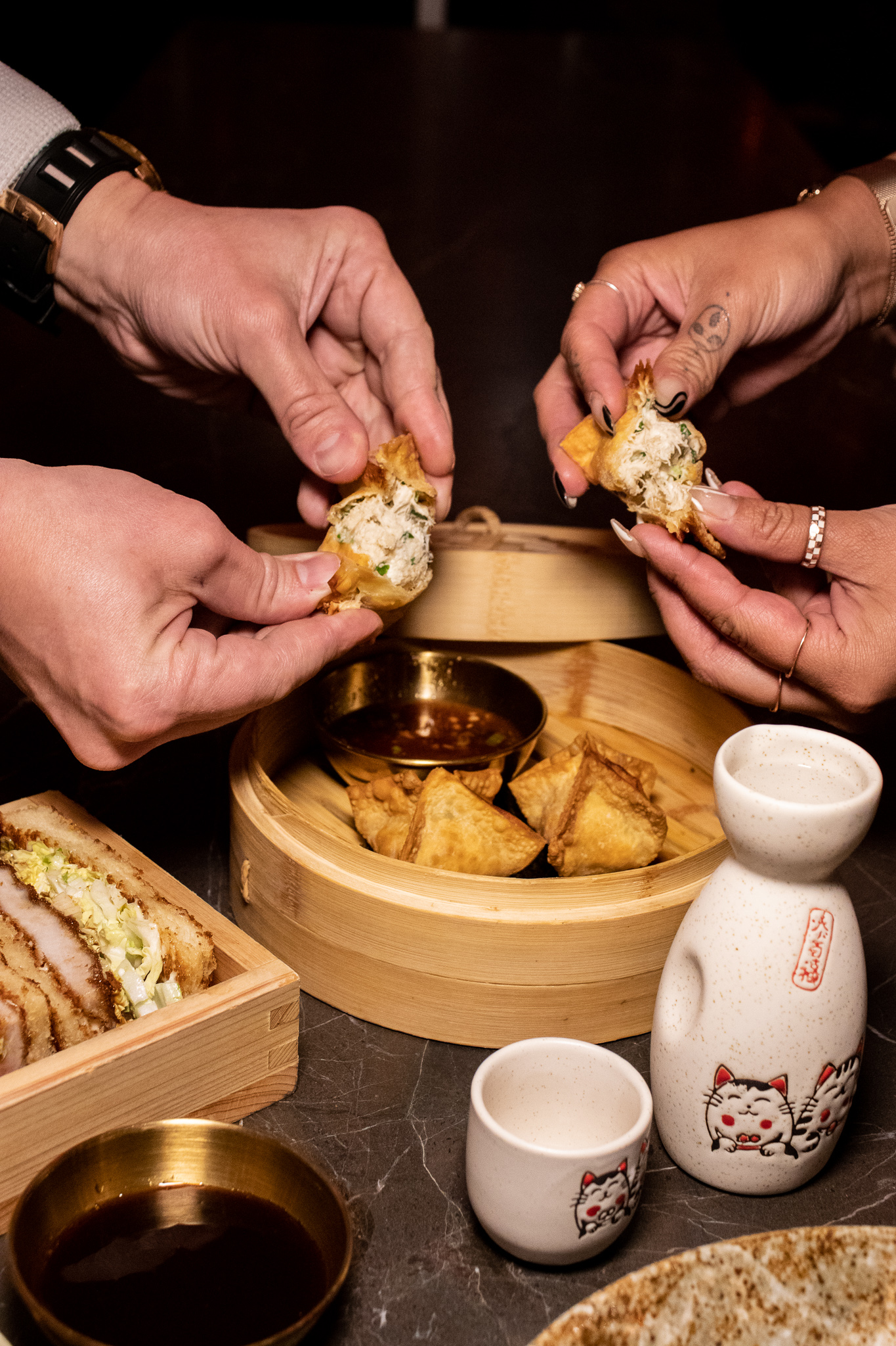 a person holding a plate of food