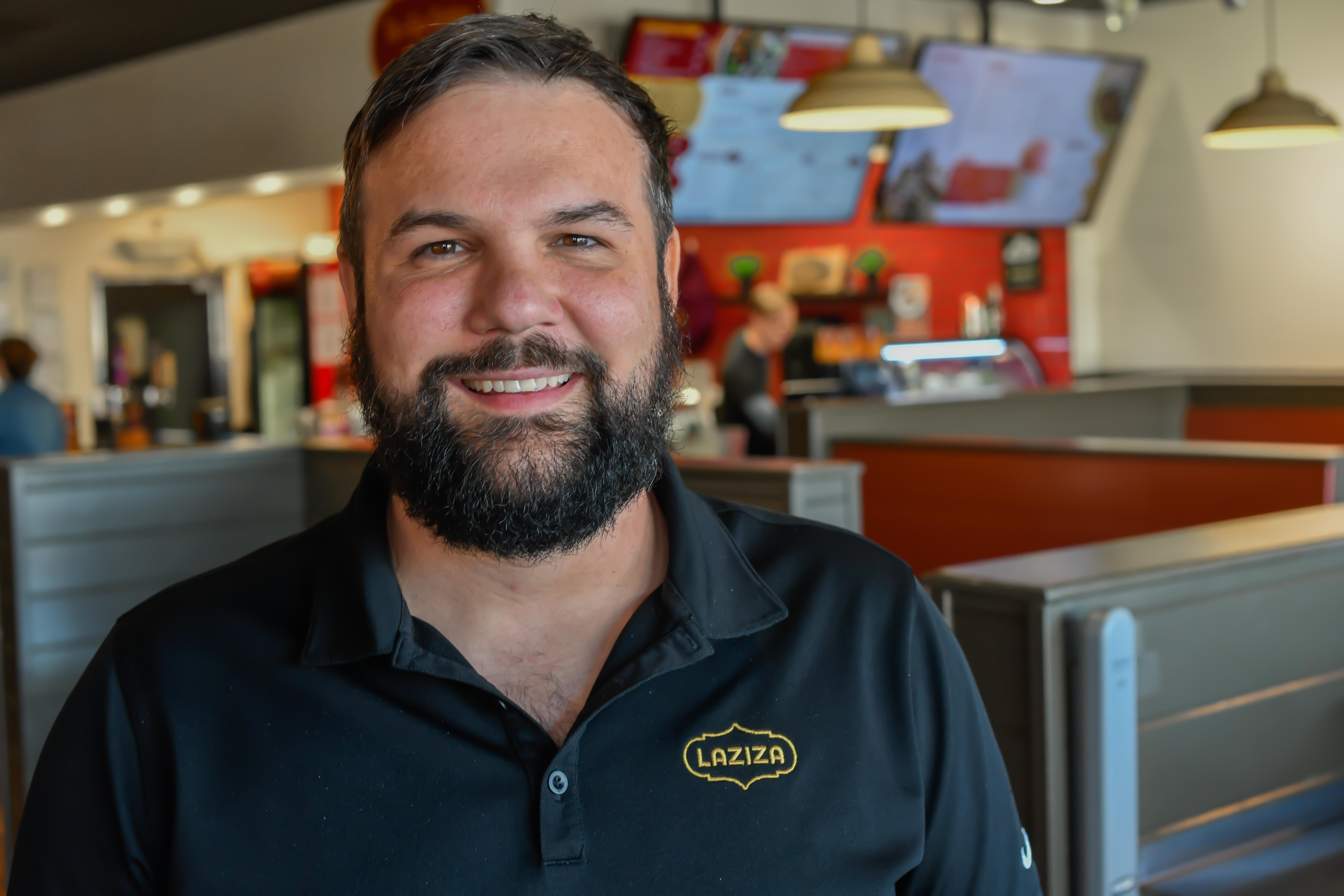 a man in a blue shirt