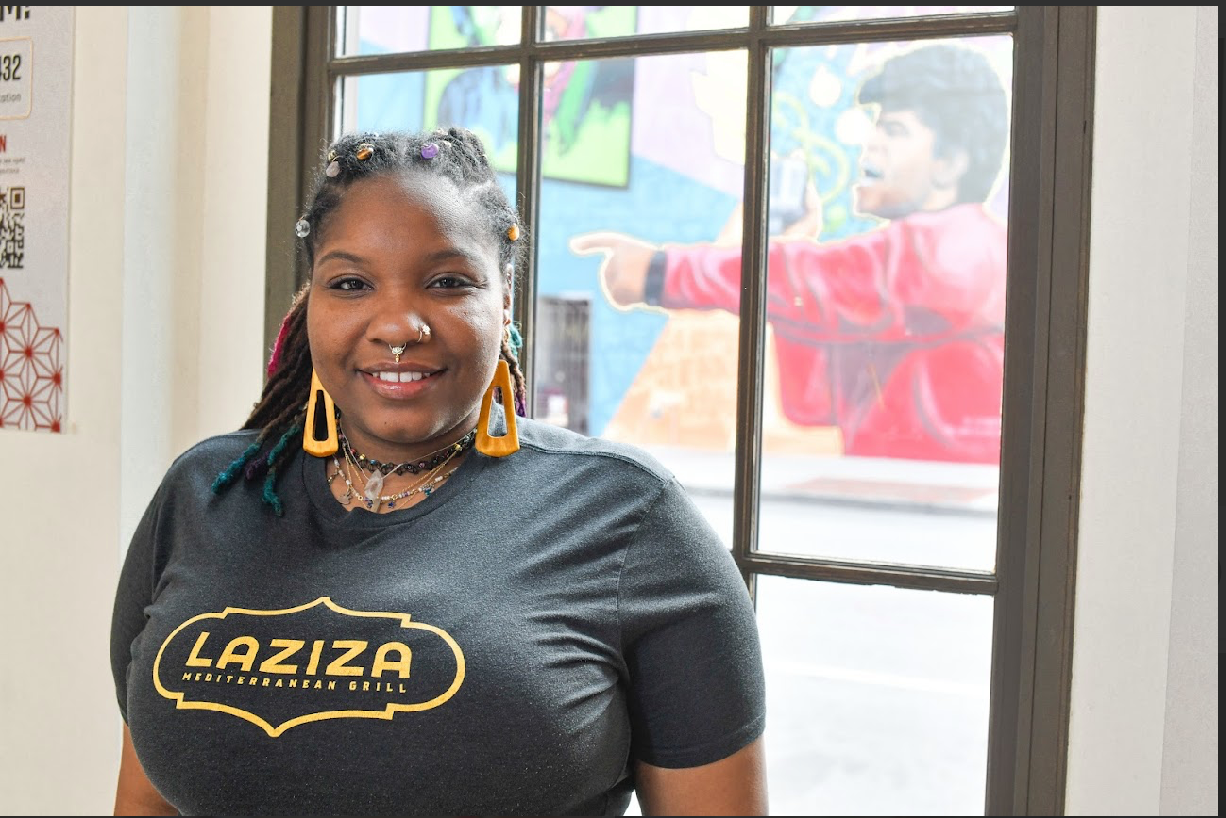 a person standing in front of a window