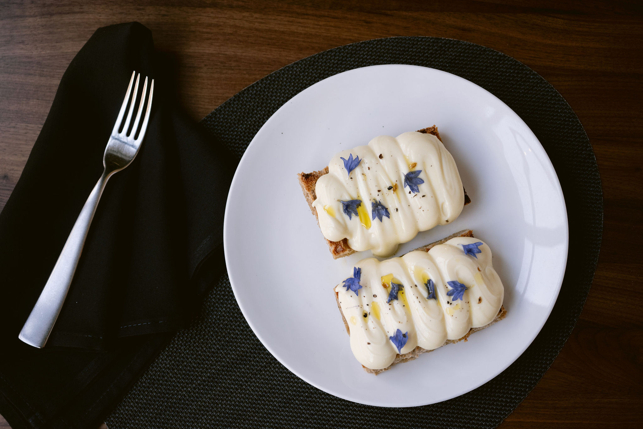 food on a plate with a fork and knife