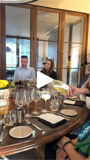 Guests enjoy paired wine tastings from CIA’s Winemaker Dinner at The Grove Restaurant in Napa, CA.