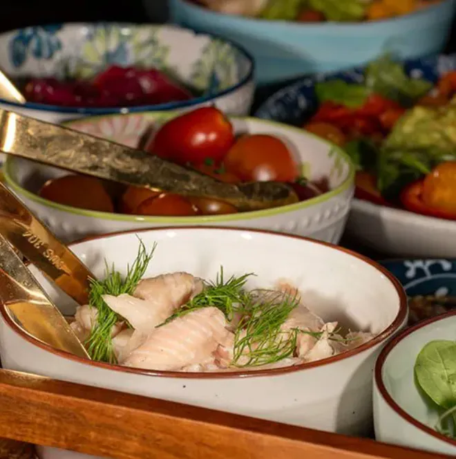 a group of bowls of food