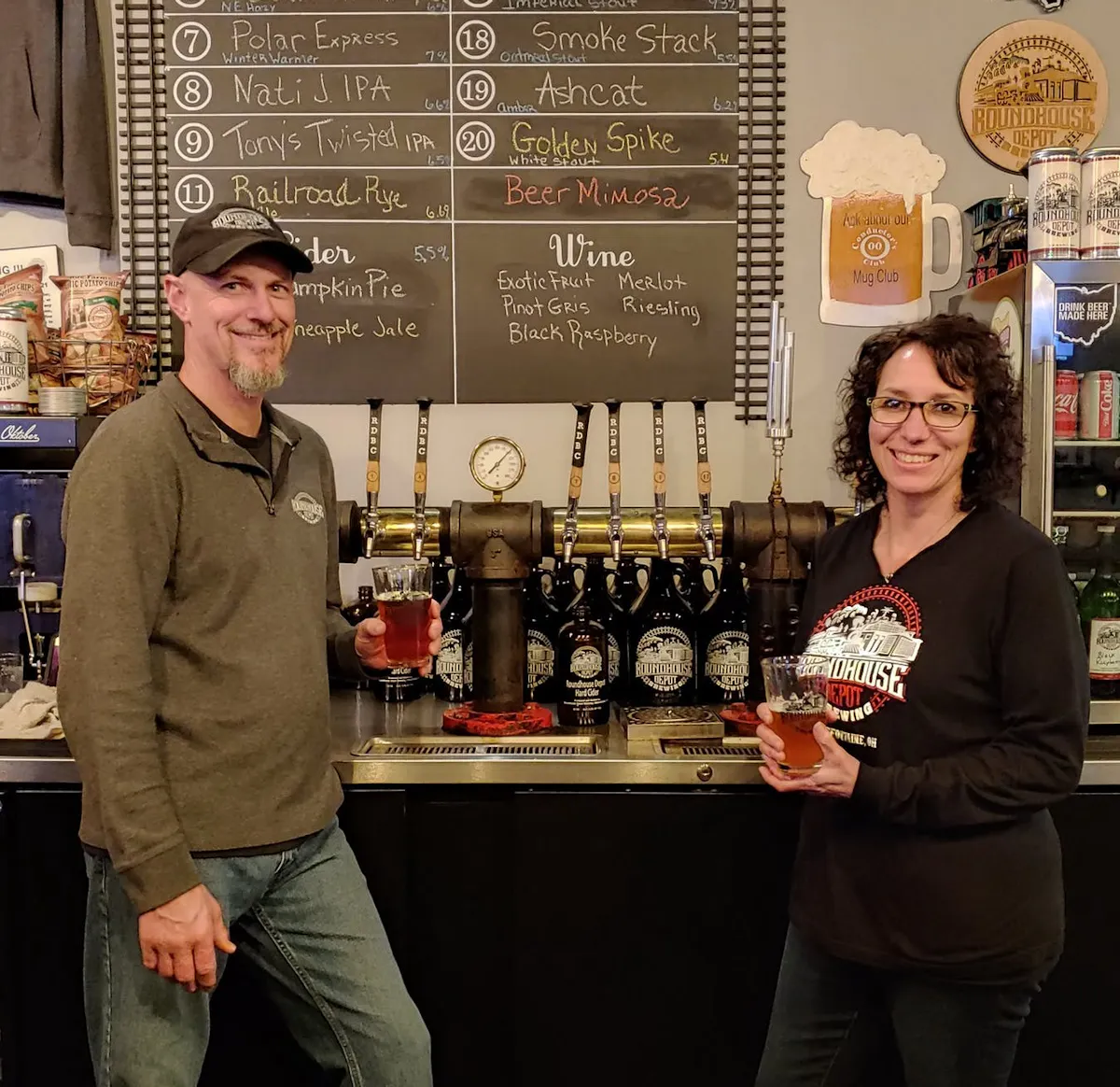 a man and a woman standing in front of a store