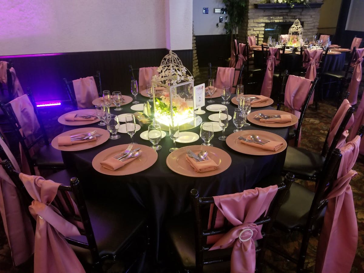 a group of pink flowers on a table