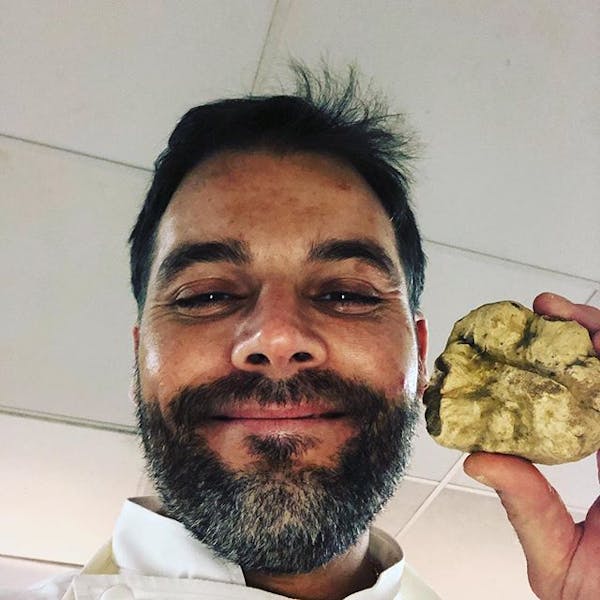 a man smiling for the camera
