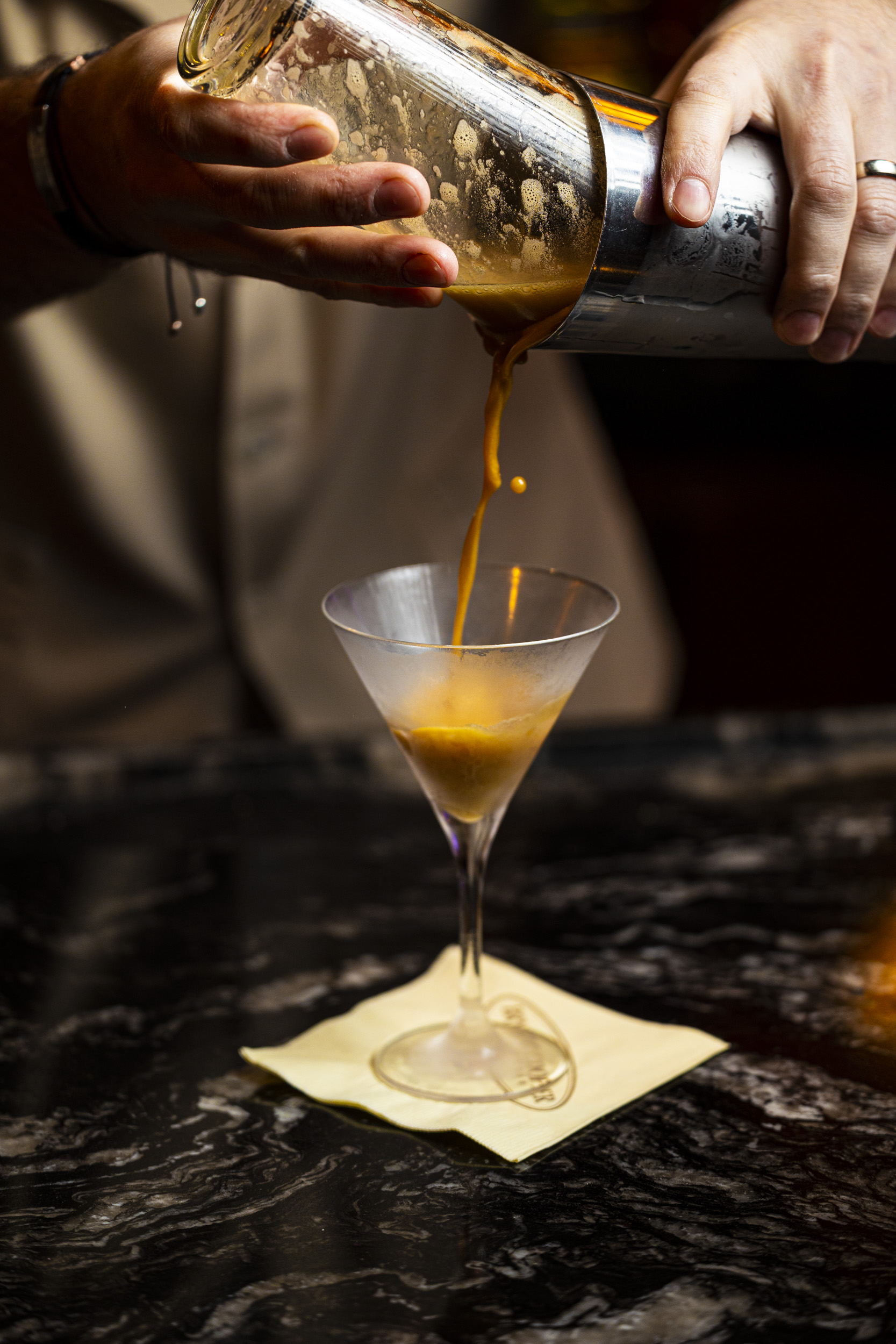an espresso martini being poured