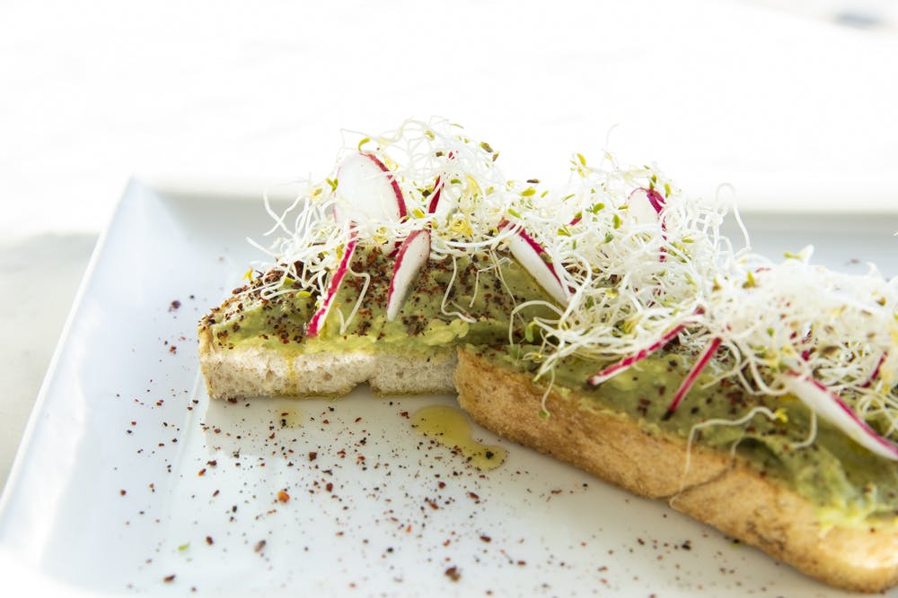 a sandwich cut in half on a plate