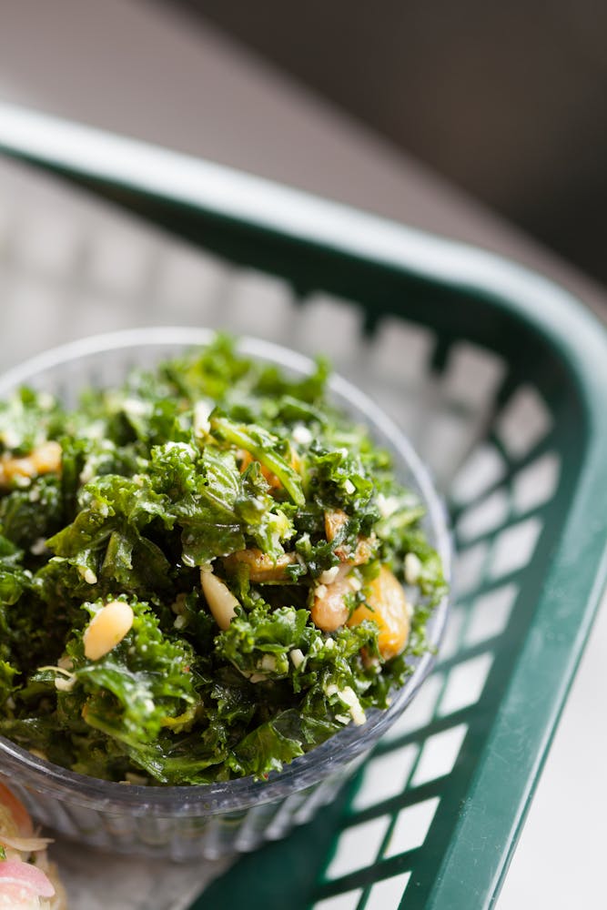 a bowl of food with broccoli
