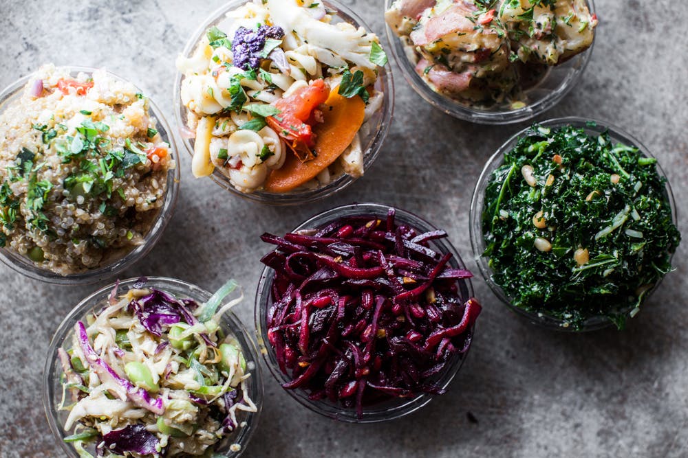 many different types of food on a table