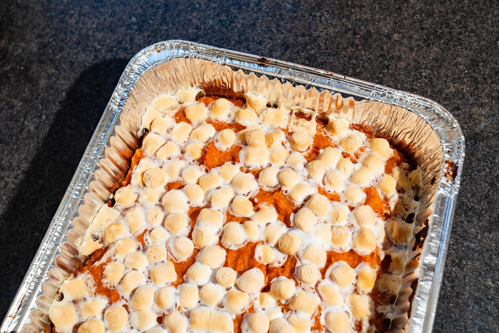 a tray of food with marshmallows