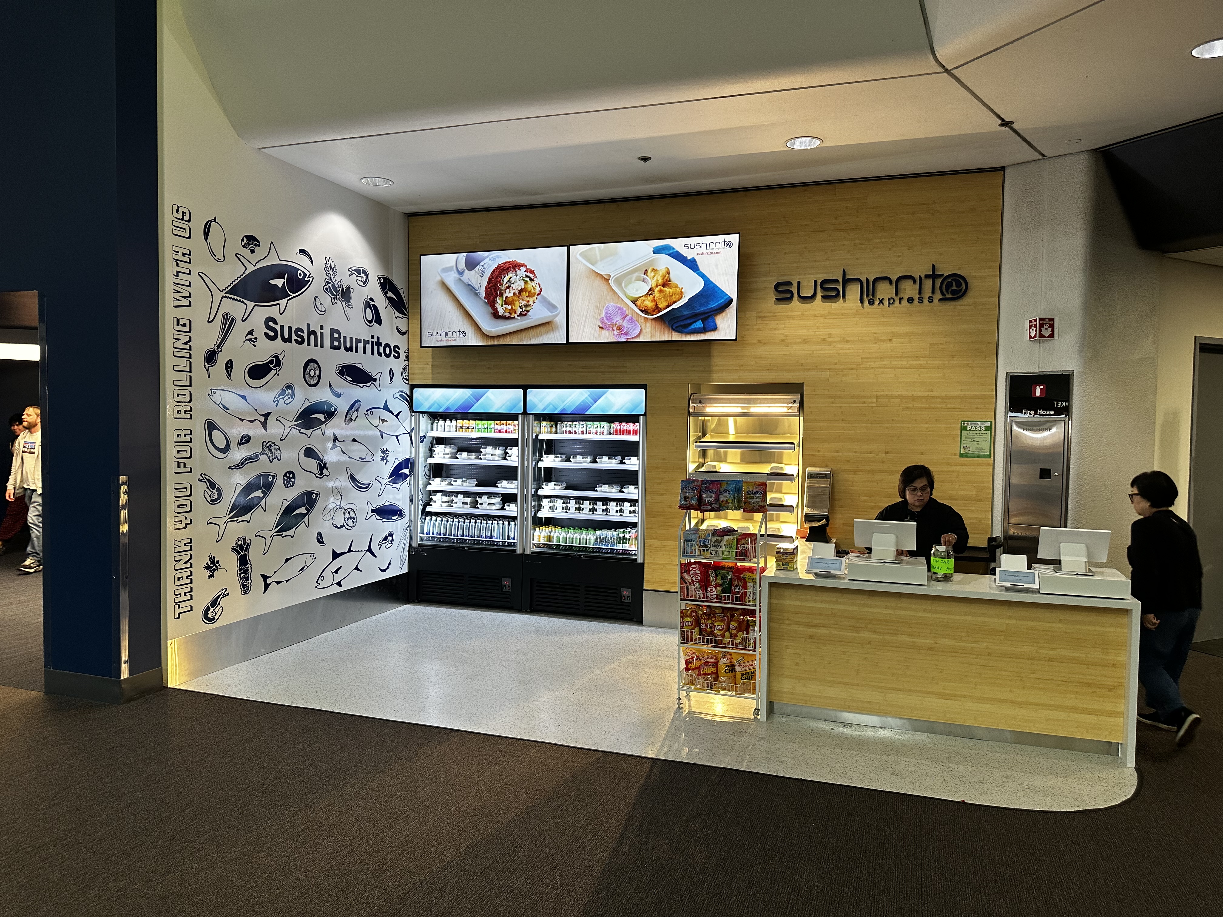 a person standing in front of a store