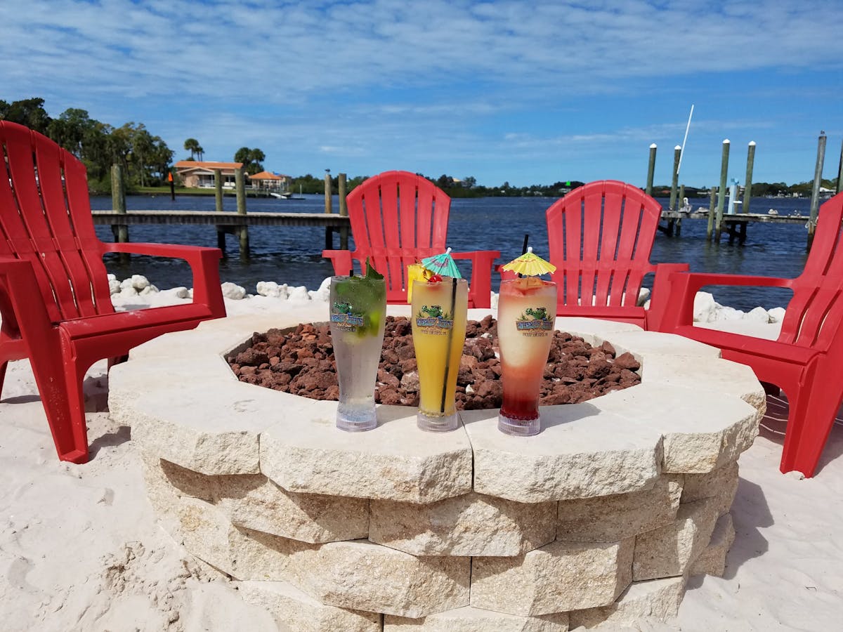 cocktails sitting on a fire pit